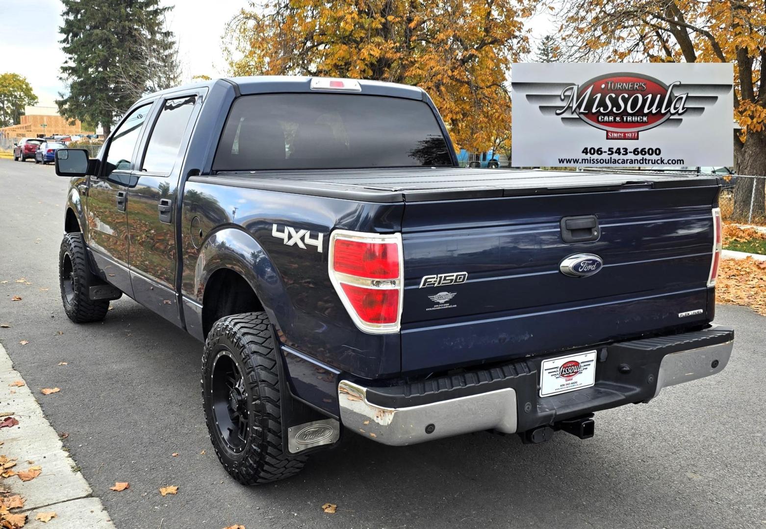 2013 Blue /Black Ford F-150 XLT SuperCrew 6.5-ft. Bed 4WD (1FTFW1EF1DK) with an 5.0L V8 engine, 6-Speed Automatic transmission, located at 450 N Russell, Missoula, MT, 59801, (406) 543-6600, 46.874496, -114.017433 - Don't let the miles scare you. This truck runs amazing. 4WD. 5.0 V8 Engine. Automatic Transmission. Air. Cruise. Tilt. Power Windows and Locks. Backup Camera. AM FM XM. Bluetooth for Audio and Phone. Nice custom Wheels. Tonneau Cover. Clean Carfax and Title. Financing is NOT Available on this V - Photo#3