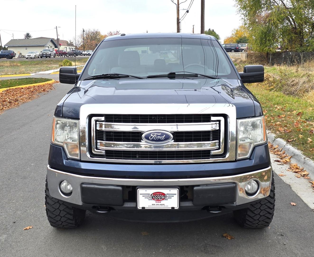 2013 Blue /Black Ford F-150 XLT SuperCrew 6.5-ft. Bed 4WD (1FTFW1EF1DK) with an 5.0L V8 engine, 6-Speed Automatic transmission, located at 450 N Russell, Missoula, MT, 59801, (406) 543-6600, 46.874496, -114.017433 - Don't let the miles scare you. This truck runs amazing. 4WD. 5.0 V8 Engine. Automatic Transmission. Air. Cruise. Tilt. Power Windows and Locks. Backup Camera. AM FM XM. Bluetooth for Audio and Phone. Nice custom Wheels. Tonneau Cover. Clean Carfax and Title. Financing is NOT Available on this V - Photo#5