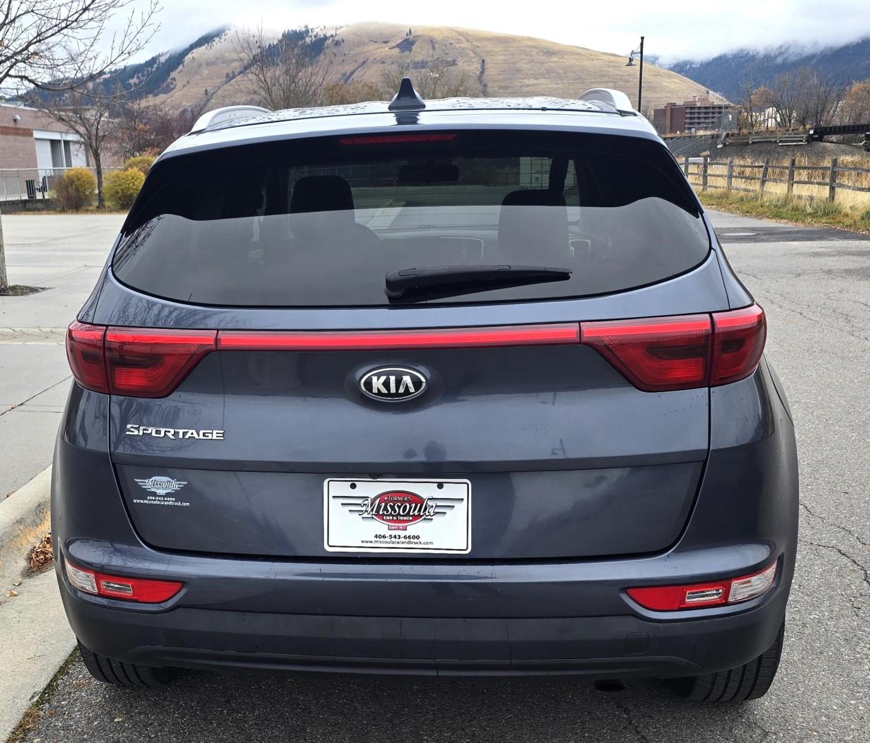 2017 Blue /White Kia Sportage LX AWD (KNDPMCACXH7) with an 2.4L V6 DOHC 24V engine, 6A transmission, located at 450 N Russell, Missoula, MT, 59801, (406) 543-6600, 46.874496, -114.017433 - Great Running AWD SUV. 2.4L I4 Engine. 6 Speed Automatic Transmission. Air. Cruise. Tilt. Power Drivers Seat. Heated Front Seats. Am FM Sat. CD Player. Bluetooth Audio and Phone. Backup Camera. 2 Owner Car with a Clean Carfax. - Photo#7