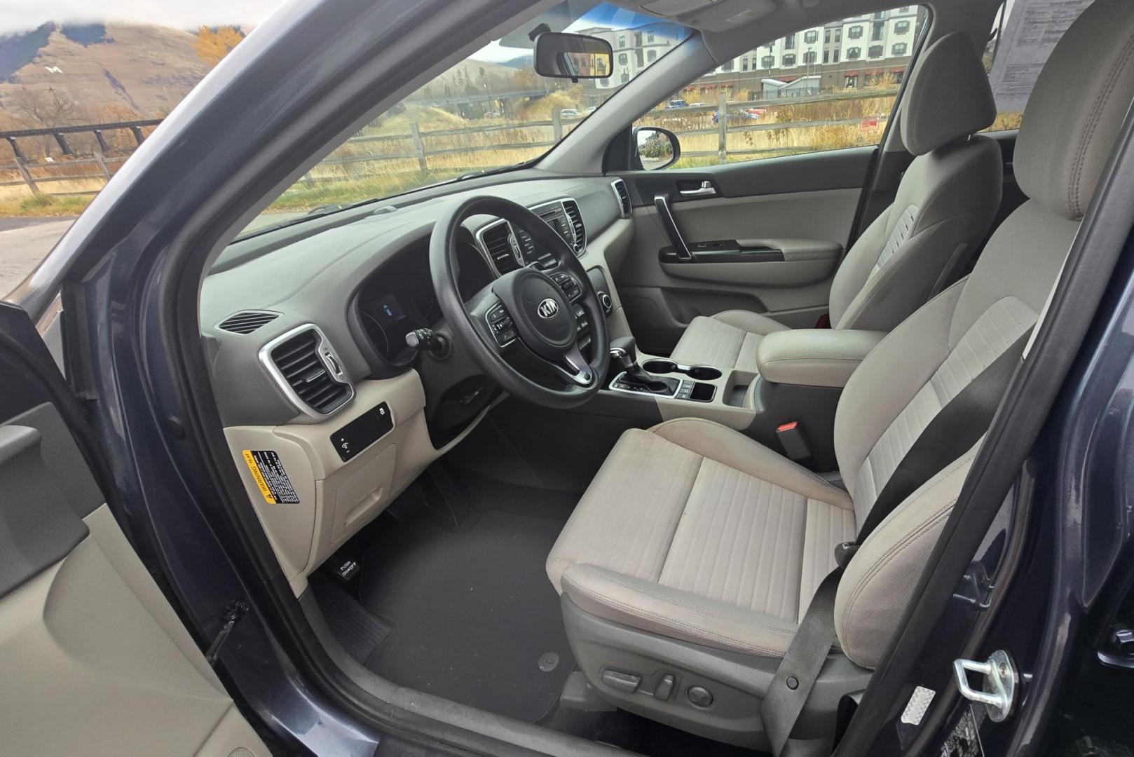 2017 Blue /White Kia Sportage LX AWD (KNDPMCACXH7) with an 2.4L V6 DOHC 24V engine, 6A transmission, located at 450 N Russell, Missoula, MT, 59801, (406) 543-6600, 46.874496, -114.017433 - Great Running AWD SUV. 2.4L I4 Engine. 6 Speed Automatic Transmission. Air. Cruise. Tilt. Power Drivers Seat. Heated Front Seats. Am FM Sat. CD Player. Bluetooth Audio and Phone. Backup Camera. 2 Owner Car with a Clean Carfax. - Photo#13