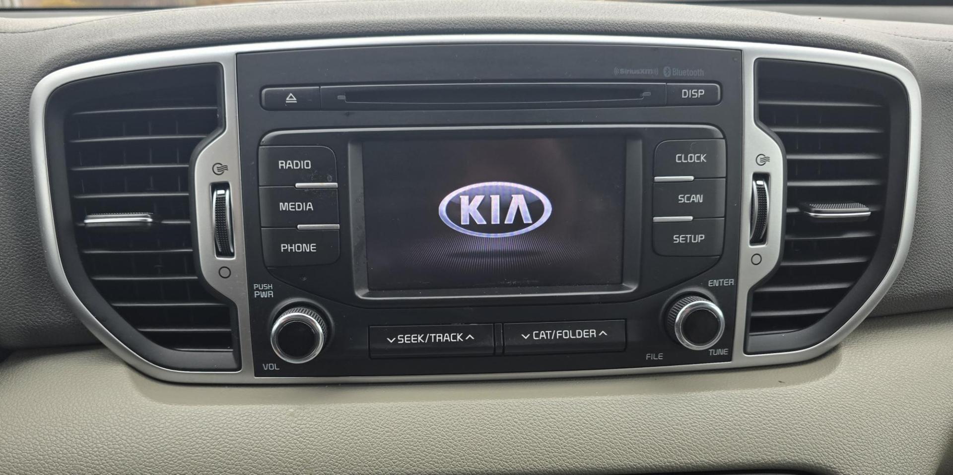 2017 Blue /White Kia Sportage LX AWD (KNDPMCACXH7) with an 2.4L V6 DOHC 24V engine, 6A transmission, located at 450 N Russell, Missoula, MT, 59801, (406) 543-6600, 46.874496, -114.017433 - Great Running AWD SUV. 2.4L I4 Engine. 6 Speed Automatic Transmission. Air. Cruise. Tilt. Power Drivers Seat. Heated Front Seats. Am FM Sat. CD Player. Bluetooth Audio and Phone. Backup Camera. 2 Owner Car with a Clean Carfax. - Photo#17
