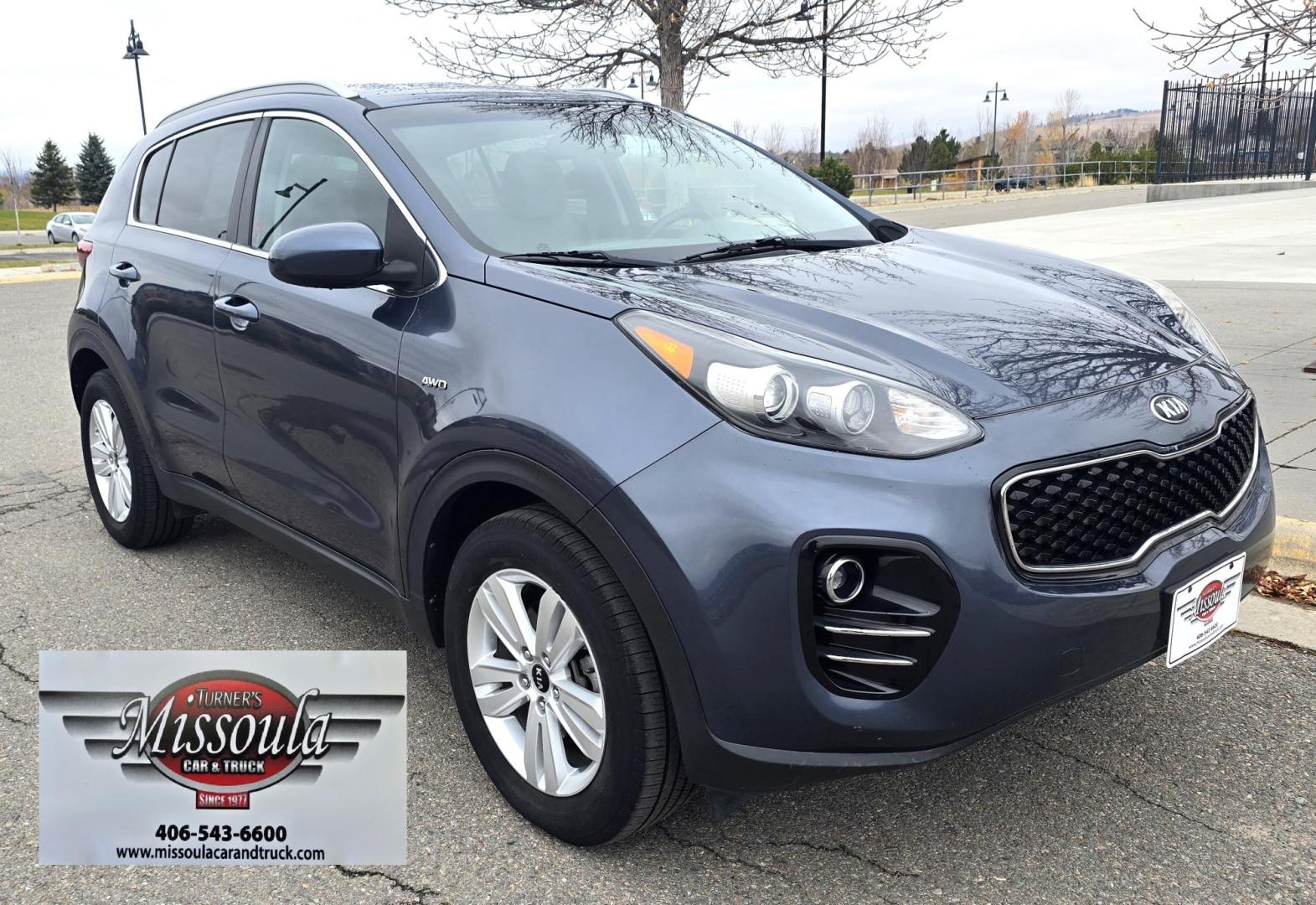 2017 Blue /White Kia Sportage LX AWD (KNDPMCACXH7) with an 2.4L V6 DOHC 24V engine, 6A transmission, located at 450 N Russell, Missoula, MT, 59801, (406) 543-6600, 46.874496, -114.017433 - Great Running AWD SUV. 2.4L I4 Engine. 6 Speed Automatic Transmission. Air. Cruise. Tilt. Power Drivers Seat. Heated Front Seats. Am FM Sat. CD Player. Bluetooth Audio and Phone. Backup Camera. 2 Owner Car with a Clean Carfax. - Photo#2