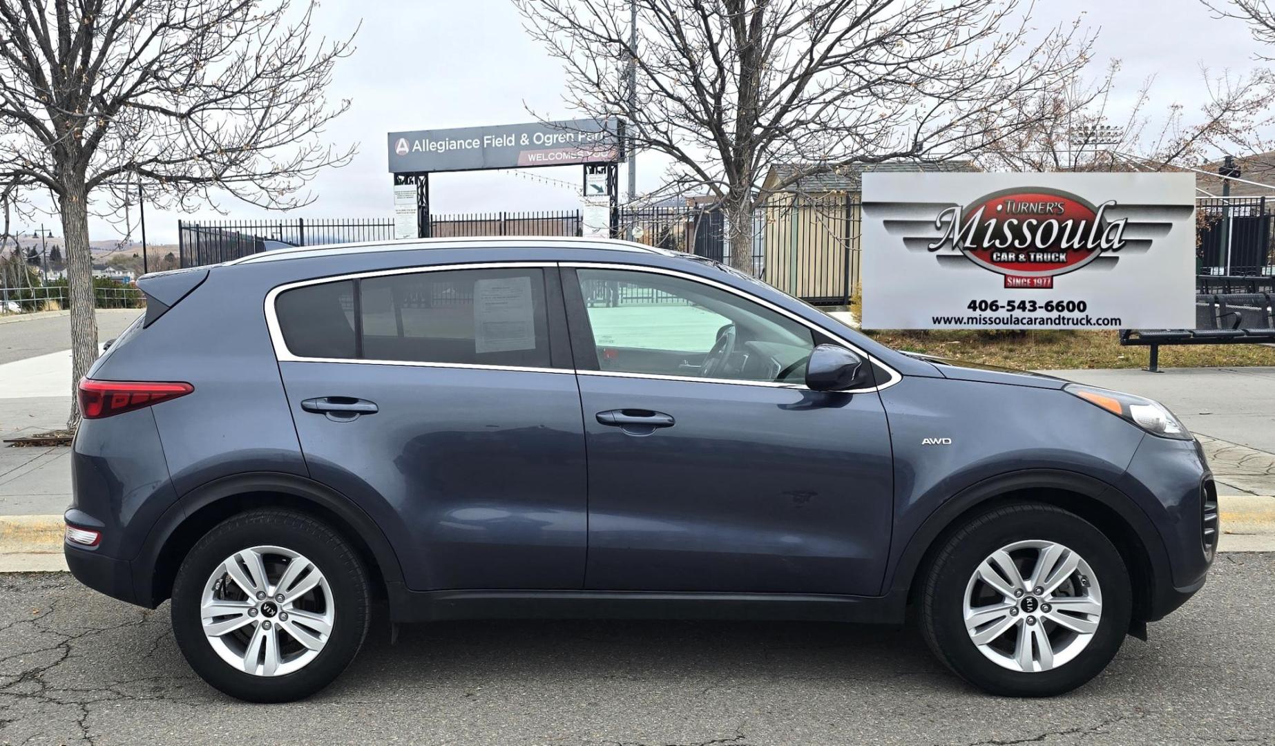 2017 Blue /White Kia Sportage LX AWD (KNDPMCACXH7) with an 2.4L V6 DOHC 24V engine, 6A transmission, located at 450 N Russell, Missoula, MT, 59801, (406) 543-6600, 46.874496, -114.017433 - Great Running AWD SUV. 2.4L I4 Engine. 6 Speed Automatic Transmission. Air. Cruise. Tilt. Power Drivers Seat. Heated Front Seats. Am FM Sat. CD Player. Bluetooth Audio and Phone. Backup Camera. 2 Owner Car with a Clean Carfax. - Photo#0
