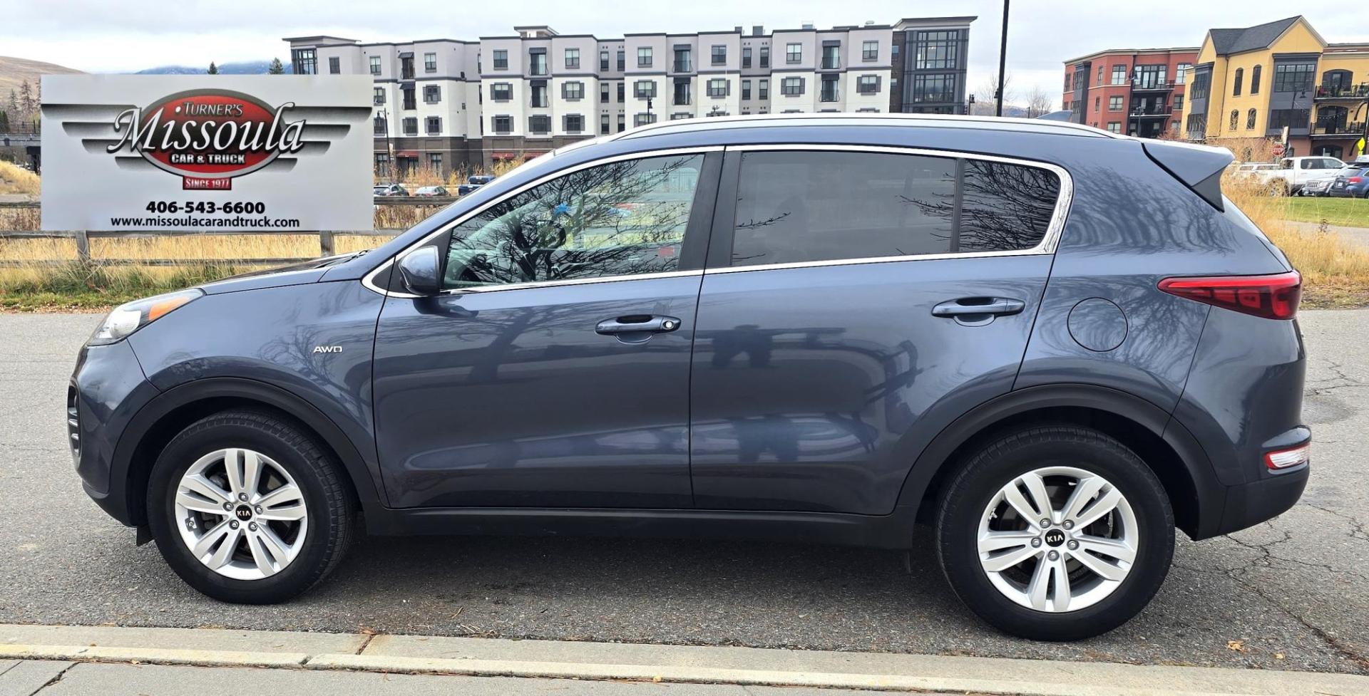 2017 Blue /White Kia Sportage LX AWD (KNDPMCACXH7) with an 2.4L V6 DOHC 24V engine, 6A transmission, located at 450 N Russell, Missoula, MT, 59801, (406) 543-6600, 46.874496, -114.017433 - Great Running AWD SUV. 2.4L I4 Engine. 6 Speed Automatic Transmission. Air. Cruise. Tilt. Power Drivers Seat. Heated Front Seats. Am FM Sat. CD Player. Bluetooth Audio and Phone. Backup Camera. 2 Owner Car with a Clean Carfax. - Photo#4