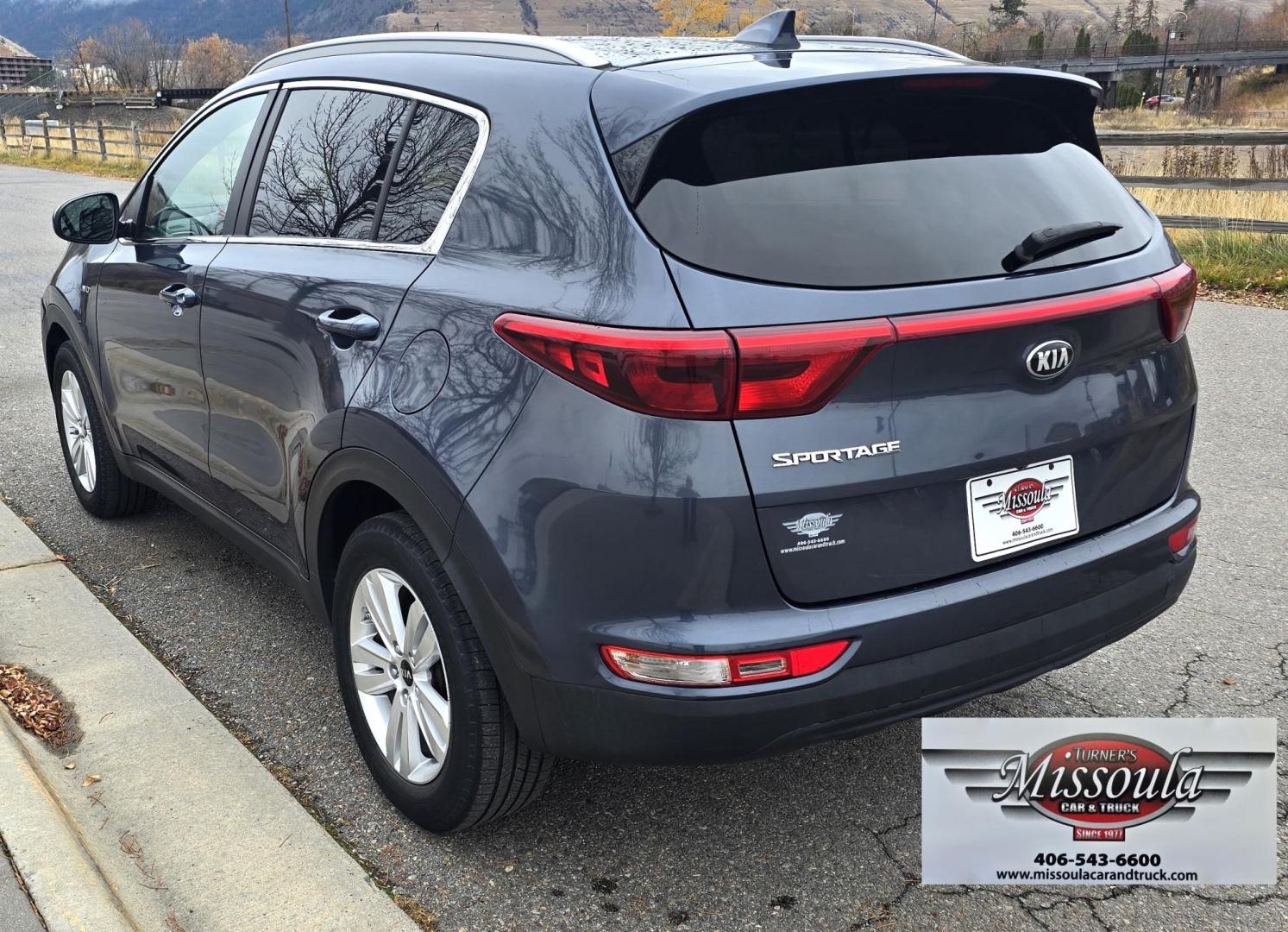 2017 Blue /White Kia Sportage LX AWD (KNDPMCACXH7) with an 2.4L V6 DOHC 24V engine, 6A transmission, located at 450 N Russell, Missoula, MT, 59801, (406) 543-6600, 46.874496, -114.017433 - Great Running AWD SUV. 2.4L I4 Engine. 6 Speed Automatic Transmission. Air. Cruise. Tilt. Power Drivers Seat. Heated Front Seats. Am FM Sat. CD Player. Bluetooth Audio and Phone. Backup Camera. 2 Owner Car with a Clean Carfax. - Photo#6