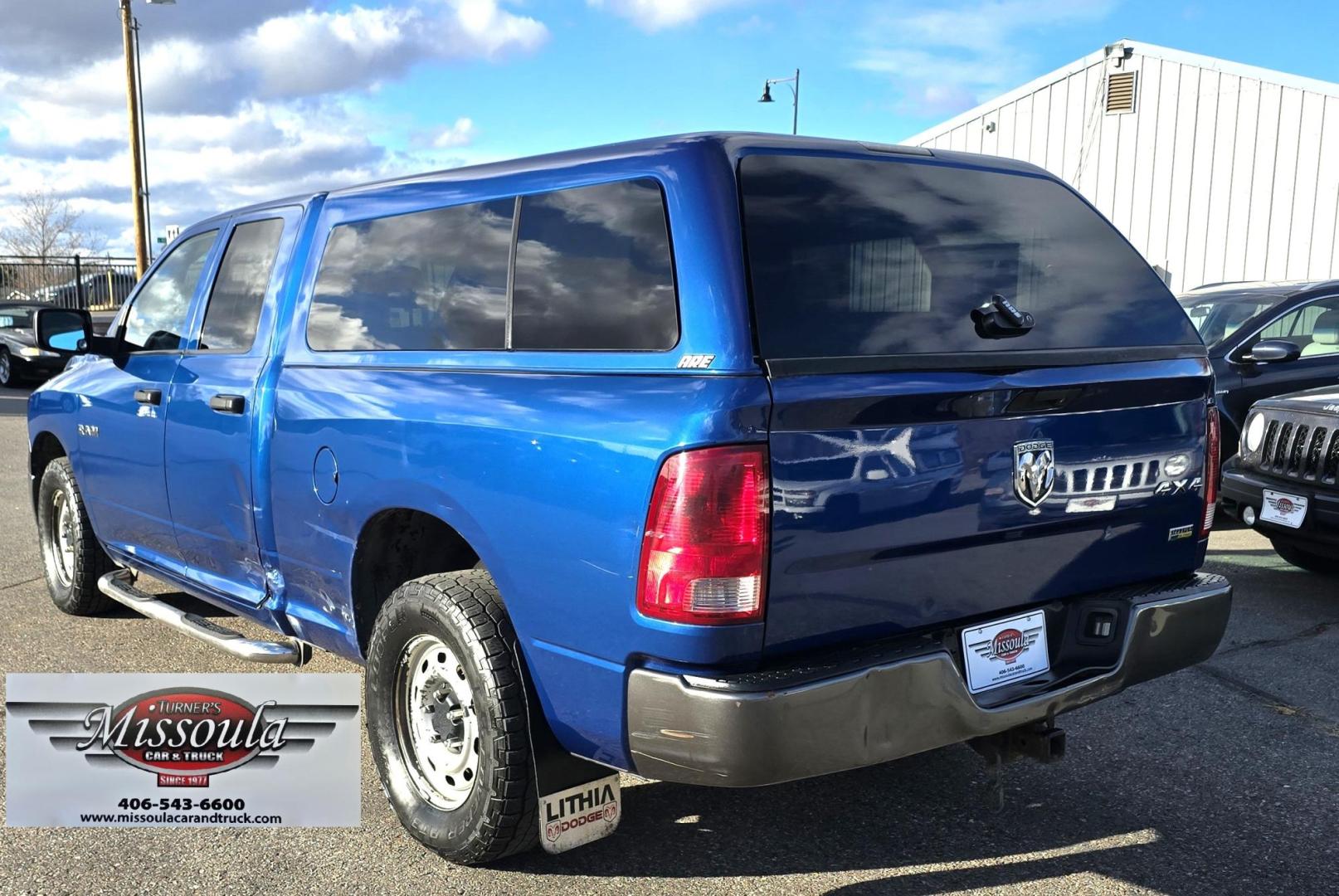 2010 Blue /Black Dodge Ram 1500 Laramie Quad Cab 4WD (1D7RV1GP2AS) with an 4.7L V8 SOHC 16V FFV engine, 5-Speed Automatic transmission, located at 450 N Russell, Missoula, MT, 59801, (406) 543-6600, 46.874496, -114.017433 - Don't let the miles scare you. This Truck runs amazing!! 4 Wheel Drive. Automatic Transmission. 4.7L V8 Engine. Nice matching topper. Air. Cruise. Tilt. Power Windows and Locks. Towing. Because of the miles, Financing is NOT Available. - Photo#3