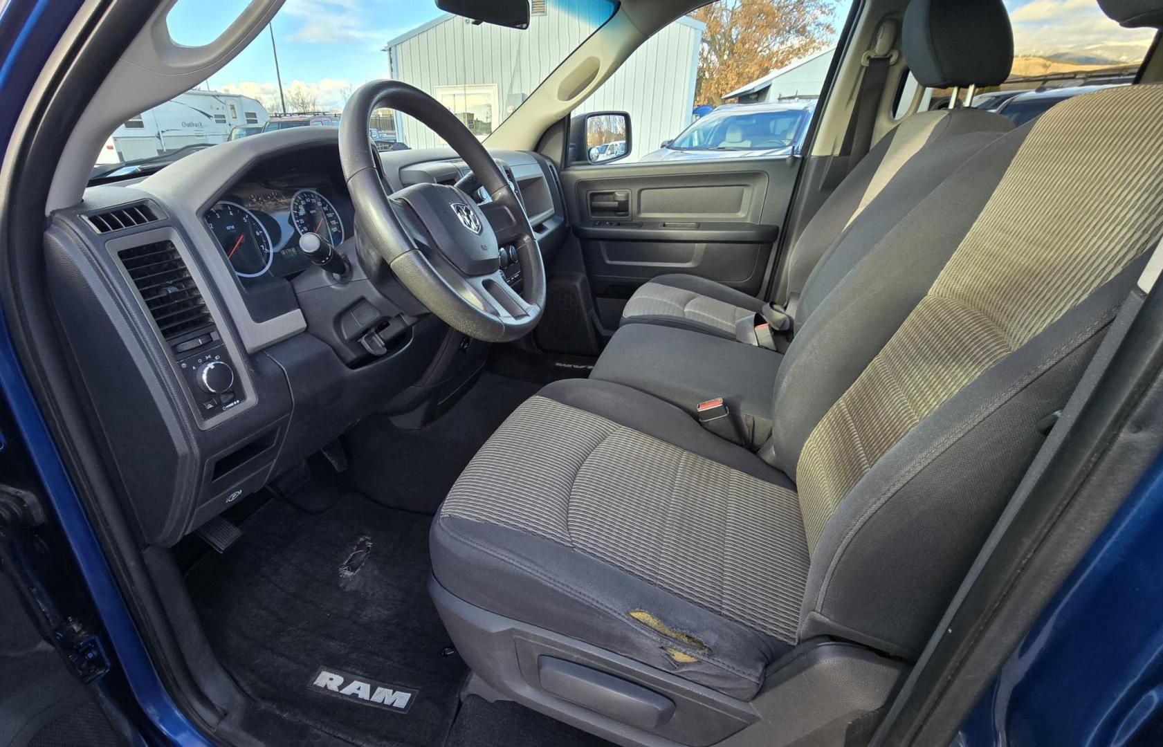2010 Blue /Black Dodge Ram 1500 Laramie Quad Cab 4WD (1D7RV1GP2AS) with an 4.7L V8 SOHC 16V FFV engine, 5-Speed Automatic transmission, located at 450 N Russell, Missoula, MT, 59801, (406) 543-6600, 46.874496, -114.017433 - Don't let the miles scare you. This Truck runs amazing!! 4 Wheel Drive. Automatic Transmission. 4.7L V8 Engine. Nice matching topper. Air. Cruise. Tilt. Power Windows and Locks. Towing. Because of the miles, Financing is NOT Available. - Photo#10