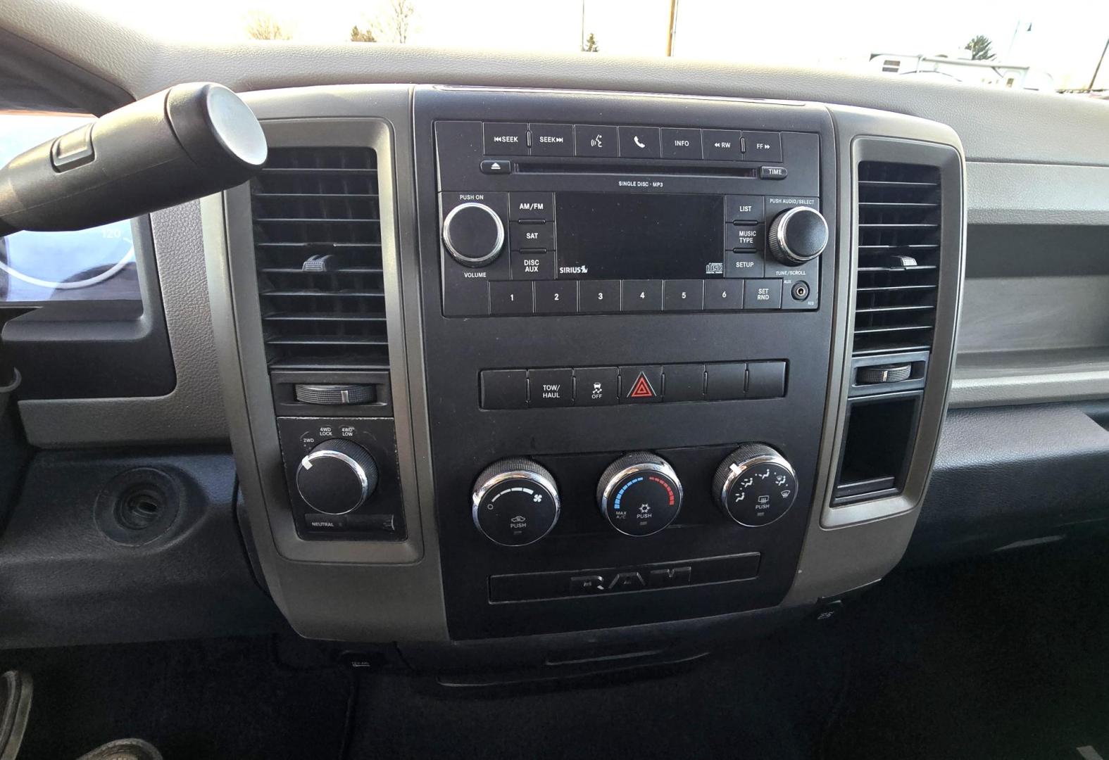 2010 Blue /Black Dodge Ram 1500 Laramie Quad Cab 4WD (1D7RV1GP2AS) with an 4.7L V8 SOHC 16V FFV engine, 5-Speed Automatic transmission, located at 450 N Russell, Missoula, MT, 59801, (406) 543-6600, 46.874496, -114.017433 - Don't let the miles scare you. This Truck runs amazing!! 4 Wheel Drive. Automatic Transmission. 4.7L V8 Engine. Nice matching topper. Air. Cruise. Tilt. Power Windows and Locks. Towing. Because of the miles, Financing is NOT Available. - Photo#12