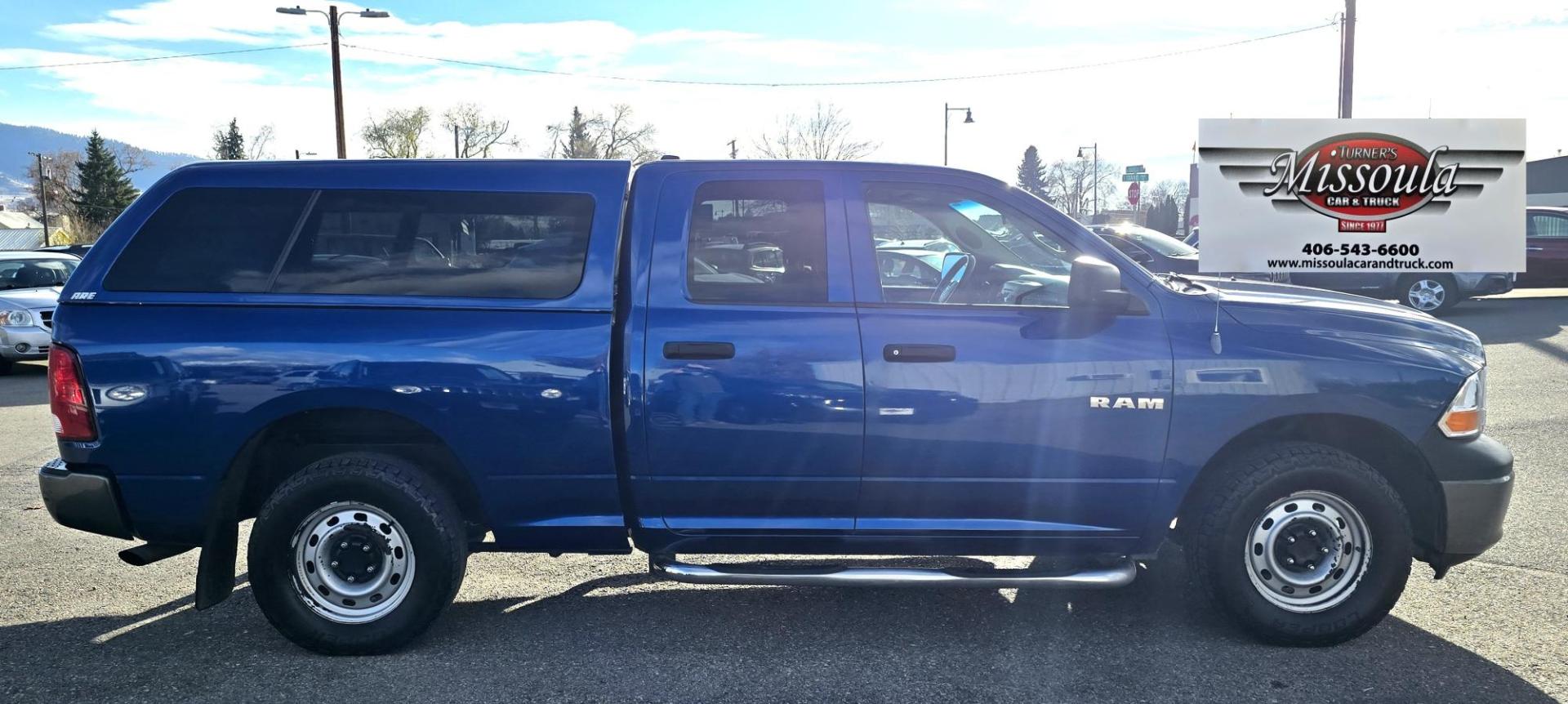 2010 Blue /Black Dodge Ram 1500 Laramie Quad Cab 4WD (1D7RV1GP2AS) with an 4.7L V8 SOHC 16V FFV engine, 5-Speed Automatic transmission, located at 450 N Russell, Missoula, MT, 59801, (406) 543-6600, 46.874496, -114.017433 - Don't let the miles scare you. This Truck runs amazing!! 4 Wheel Drive. Automatic Transmission. 4.7L V8 Engine. Nice matching topper. Air. Cruise. Tilt. Power Windows and Locks. Towing. Because of the miles, Financing is NOT Available. - Photo#2