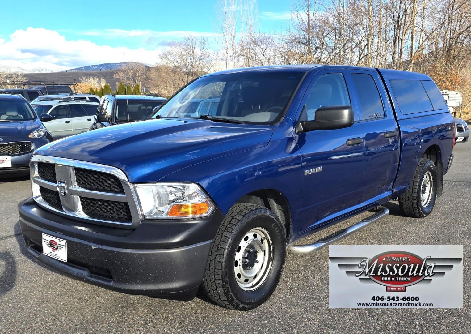 2010 Blue /Black Dodge Ram 1500 Laramie Quad Cab 4WD (1D7RV1GP2AS) with an 4.7L V8 SOHC 16V FFV engine, 5-Speed Automatic transmission, located at 450 N Russell, Missoula, MT, 59801, (406) 543-6600, 46.874496, -114.017433 - Don't let the miles scare you. This Truck runs amazing!! 4 Wheel Drive. Automatic Transmission. 4.7L V8 Engine. Nice matching topper. Air. Cruise. Tilt. Power Windows and Locks. Towing. Because of the miles, Financing is NOT Available. - Photo#1
