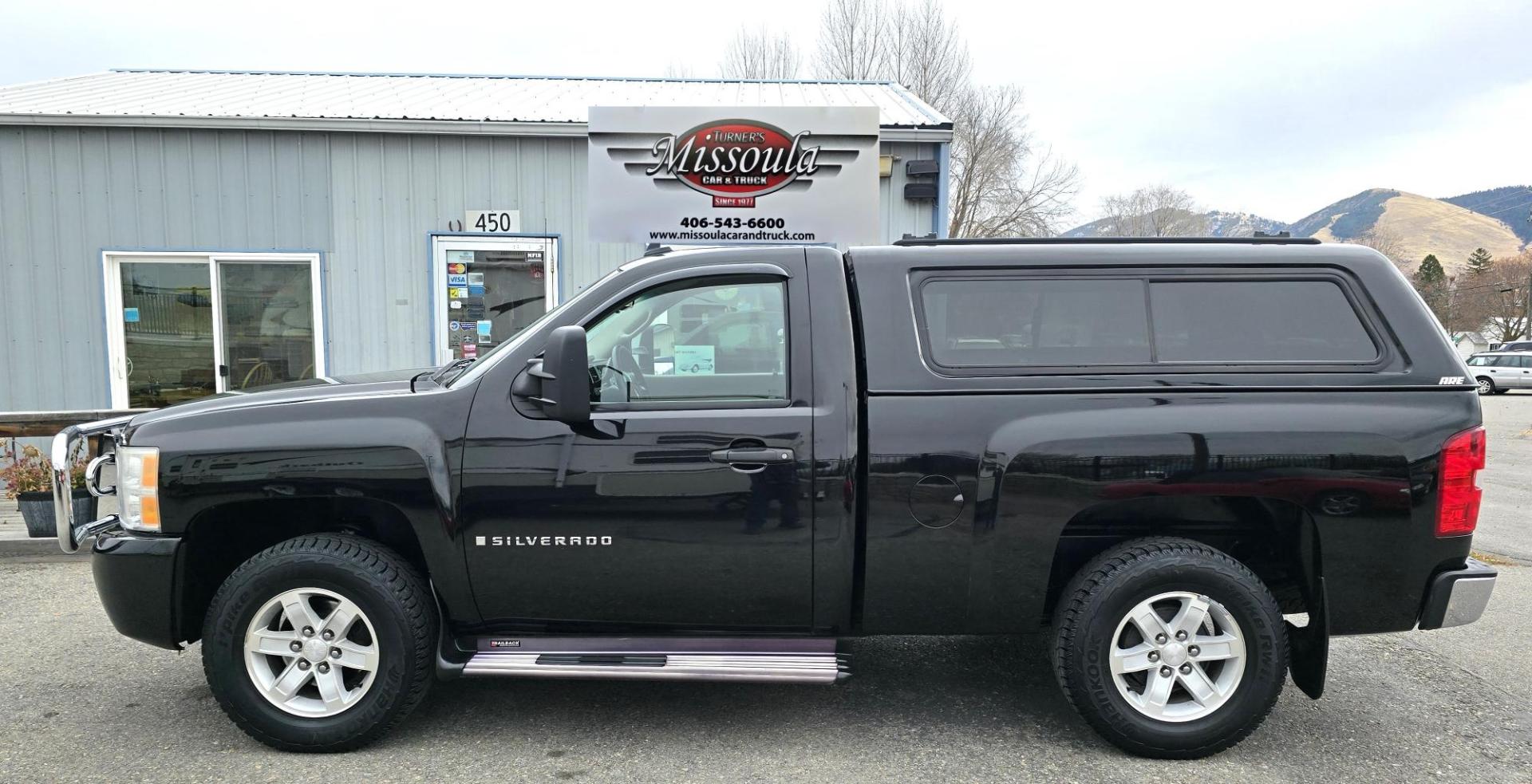2007 Black /Black Chevrolet Silverado 1500 LT1 2WD (1GCEC14C67Z) with an 4.8L V8 OHV 16V engine, 4-Speed Automatic Overdrive transmission, located at 450 N Russell, Missoula, MT, 59801, (406) 543-6600, 46.874496, -114.017433 - Cute Shorty Chevy with Nice Matching Carpeted Topper. 2 Wheel Drive. 4.8L V8 Engine. Air Conditioning. Tilt. AM FM CD Player. Chrome Grill Guard. Running Boards. - Photo#0
