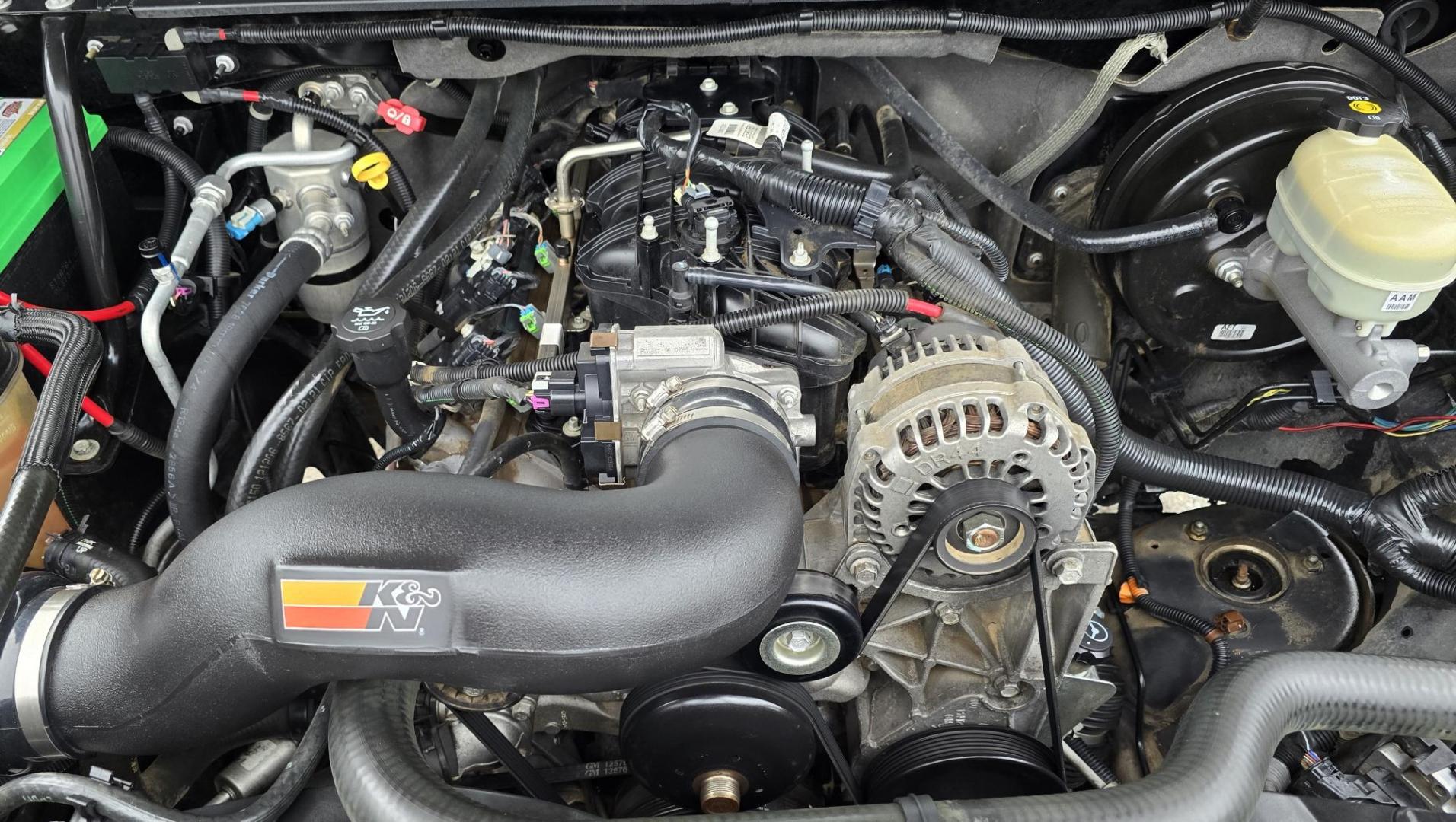 2007 Black /Black Chevrolet Silverado 1500 LT1 2WD (1GCEC14C67Z) with an 4.8L V8 OHV 16V engine, 4-Speed Automatic Overdrive transmission, located at 450 N Russell, Missoula, MT, 59801, (406) 543-6600, 46.874496, -114.017433 - Cute Shorty Chevy with Nice Matching Carpeted Topper. 2 Wheel Drive. 4.8L V8 Engine. Air Conditioning. Tilt. AM FM CD Player. Chrome Grill Guard. Running Boards. - Photo#13