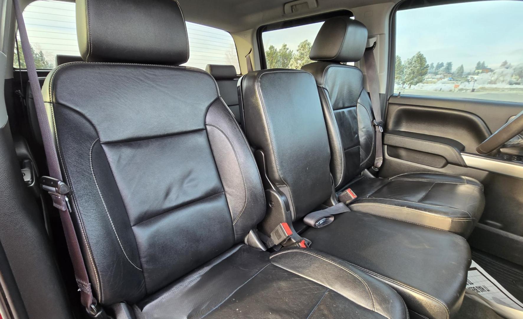 2016 Maroon /Black Chevrolet Silverado 1500 LT Crew Cab 4WD (3GCUKREC2GG) with an 5.3L V8 OHV 16V engine, 6A transmission, located at 450 N Russell, Missoula, MT, 59801, (406) 543-6600, 46.874496, -114.017433 - Great looking 4WD Chevy. 5.3L V8. Automatic. Air. Cruise. Tilt. Bluetooth Audio and Phone. OnStar Navigation. Power Windows and Locks. Remote Started. Heated Seats. Nice custom wheels. - Photo#12