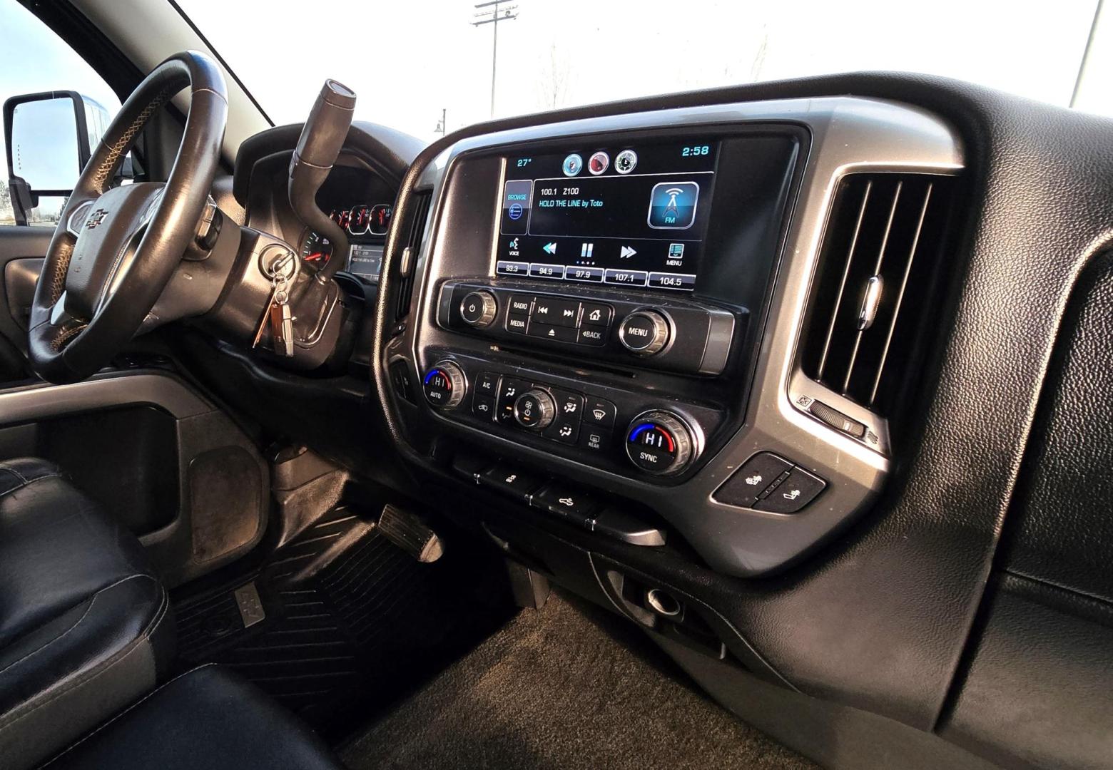 2016 Maroon /Black Chevrolet Silverado 1500 LT Crew Cab 4WD (3GCUKREC2GG) with an 5.3L V8 OHV 16V engine, 6A transmission, located at 450 N Russell, Missoula, MT, 59801, (406) 543-6600, 46.874496, -114.017433 - Great looking 4WD Chevy. 5.3L V8. Automatic. Air. Cruise. Tilt. Bluetooth Audio and Phone. OnStar Navigation. Power Windows and Locks. Remote Started. Heated Seats. Nice custom wheels. - Photo#13