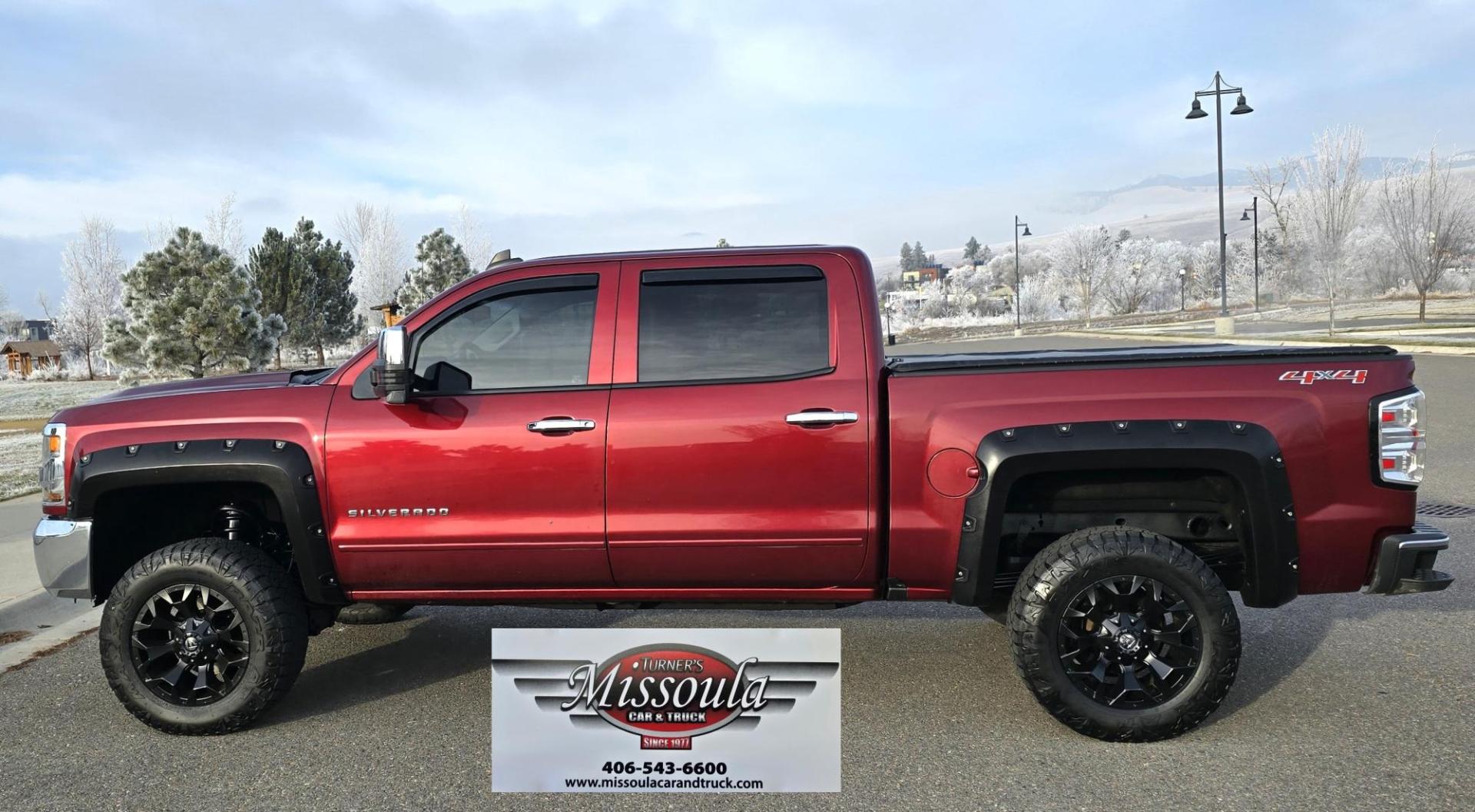 2016 Maroon /Black Chevrolet Silverado 1500 LT Crew Cab 4WD (3GCUKREC2GG) with an 5.3L V8 OHV 16V engine, 6A transmission, located at 450 N Russell, Missoula, MT, 59801, (406) 543-6600, 46.874496, -114.017433 - Great looking 4WD Chevy. 5.3L V8. Automatic. Air. Cruise. Tilt. Bluetooth Audio and Phone. OnStar Navigation. Power Windows and Locks. Remote Started. Heated Seats. Nice custom wheels. - Photo#0