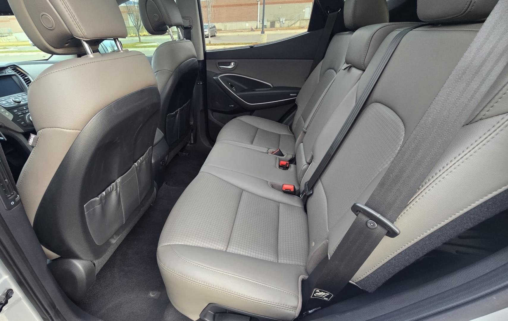 2014 Silver /Black Hyundai Santa Fe Sport 2.0T AWD (5XYZWDLA1EG) with an 2.0L L4 DOHC 16V TURBO engine, 6-Speed Automatic transmission, located at 450 N Russell, Missoula, MT, 59801, (406) 543-6600, 46.874496, -114.017433 - Really nice Santa Fe AWD. 2.0L I4 Engine. automatic Transmission. Huge Sunroof. Navigation. Bluetooth Audio and Phone. Backup Camera. Air Cruise Tilt. heated and Cooled seats. - Photo#11