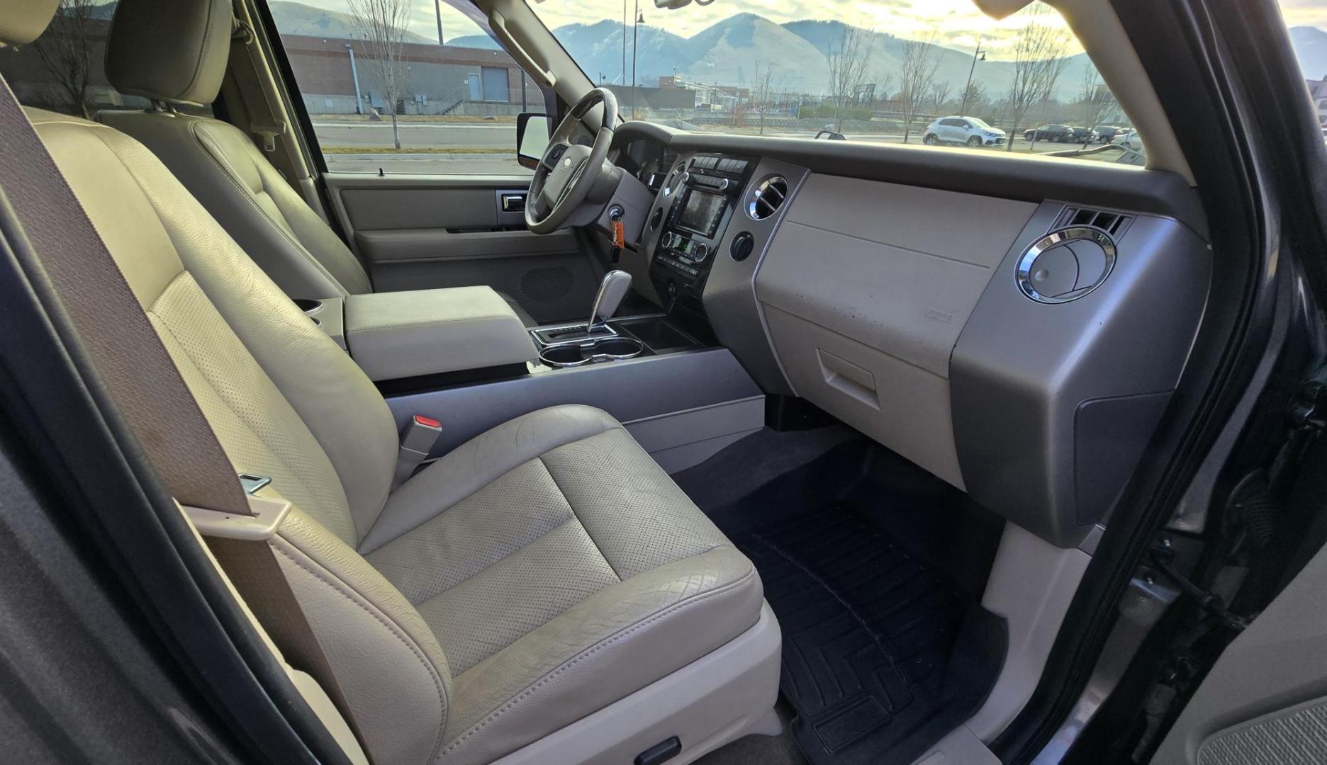2011 Grey /Tan Ford Expedition Limited 4WD (1FMJU2A50BE) with an 5.4L V8 SOHC 16V FFV engine, 6-Speed Automatic transmission, located at 450 N Russell, Missoula, MT, 59801, (406) 543-6600, 46.874496, -114.017433 - Smooth Driving 4WD SUV. 5.4L V8 Engine. 3rd Row seating. Heated and Cooled Front Seats. Heated Middle Seats. Leather. Power Sunroof. Navigation. Running Boards. Michelin Tires. Remote Start. Bluetooth Phone and Audio. Power Liftgate. - Photo#13