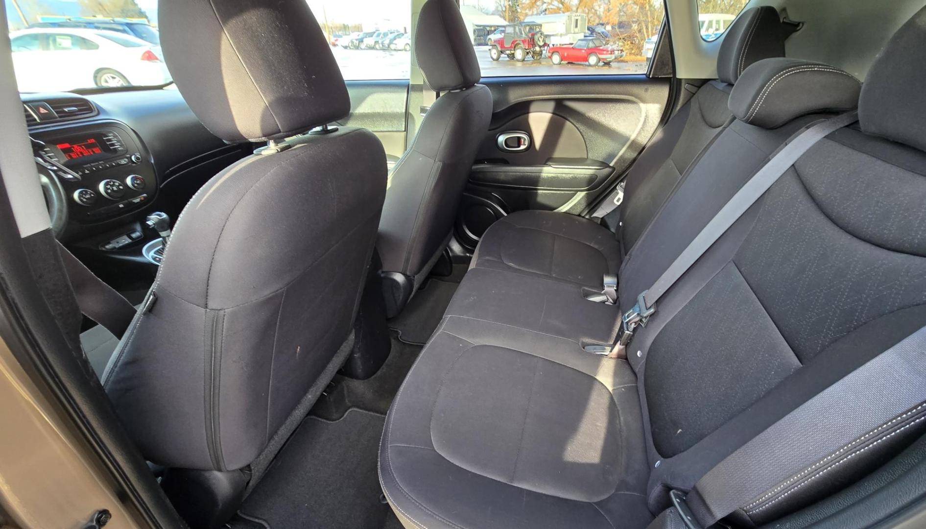2015 Brown /Black Kia Soul Base (KNDJN2A26F7) with an 1.6L L4 DOHC 16V engine, Automatic transmission, located at 450 N Russell, Missoula, MT, 59801, (406) 543-6600, 46.874496, -114.017433 - High Miles but Runs Amazing. 1.6L I4 Engine. Automatic Transmission. FWD. Air. Cruise. Tilt. AM FM CD. Bluetooth Audio and Phone. Steering Wheel Controls. Very Clean. Because of the miles, we do not offer financing on this vehicle. - Photo#11