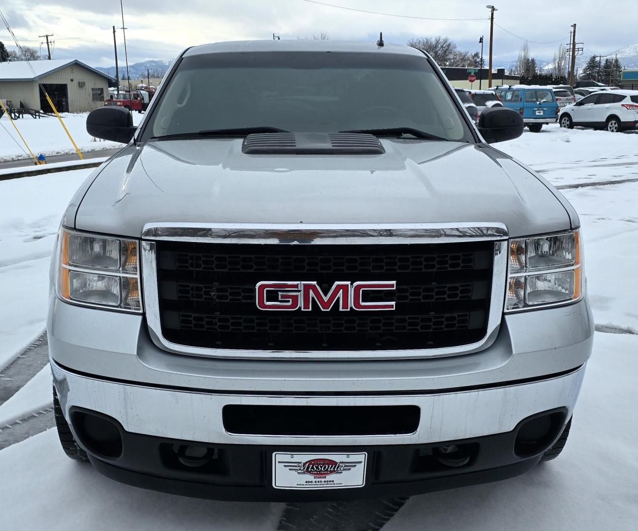 2012 Silver /Black GMC Sierra 2500HD SLE Ext. Cab 4WD (1GT220CG5CZ) with an 6.0L V8 OHV 16V FFV engine, 6-Speed Automatic transmission, located at 450 N Russell, Missoula, MT, 59801, (406) 543-6600, 46.874496, -114.017433 - Very Clean 3/4 Ton 4WD Truck. Beefy 6.0L v8 Engine. 6 Speed Automatic Transmission. Built in Electric Brake. Air. Cruise. Tilt. AM FM CD Player. Aftermarket Wheels. - Photo#6
