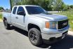2012 Silver /Black GMC Sierra 2500HD SLE Ext. Cab 4WD (1GT220CG5CZ) with an 6.0L V8 OHV 16V FFV engine, 6-Speed Automatic transmission, located at 450 N Russell, Missoula, MT, 59801, (406) 543-6600, 46.874496, -114.017433 - Very Clean 3/4 Ton 4WD Truck. Beefy 6.0L v8 Engine. 6 Speed Automatic Transmission. Built in Electric Brake. Air. Cruise. Tilt. AM FM CD Player. Aftermarket Wheels. - Photo#4