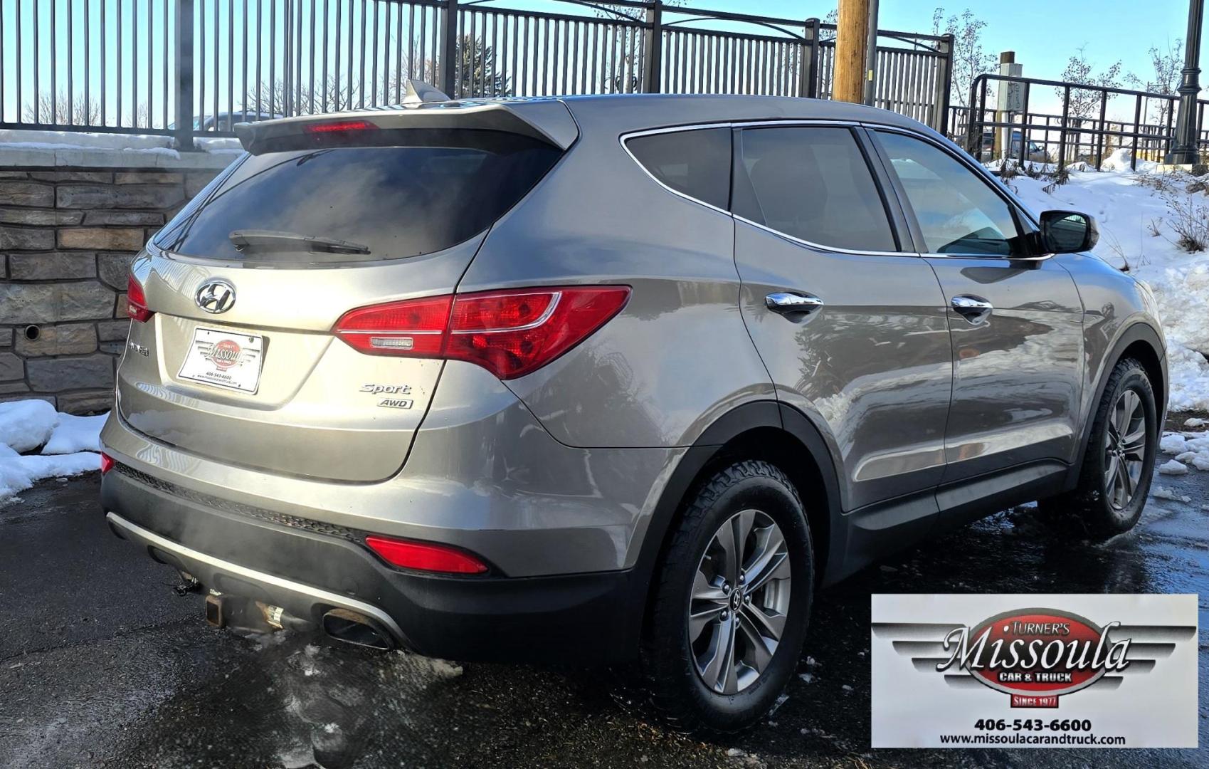 2014 Mineral Gray /Gray Hyundai Santa Fe Sport 2.4 AWD (5XYZTDLB5EG) with an 2.4L L4 DOHC 16V engine, 6-Speed Automatic transmission, located at 450 N Russell, Missoula, MT, 59801, (406) 543-6600, 46.874496, -114.017433 - Great Running FWD SUV Not all wheel drive. 2.4L I4 Engine. Automatic Transmission. Air. Cruise. Tilt. Power Windows and Locks. AM FM CD Player. Bluetooth Audio and Phone. Towing. Has a fair size scratch on the front left fender. - Photo#1