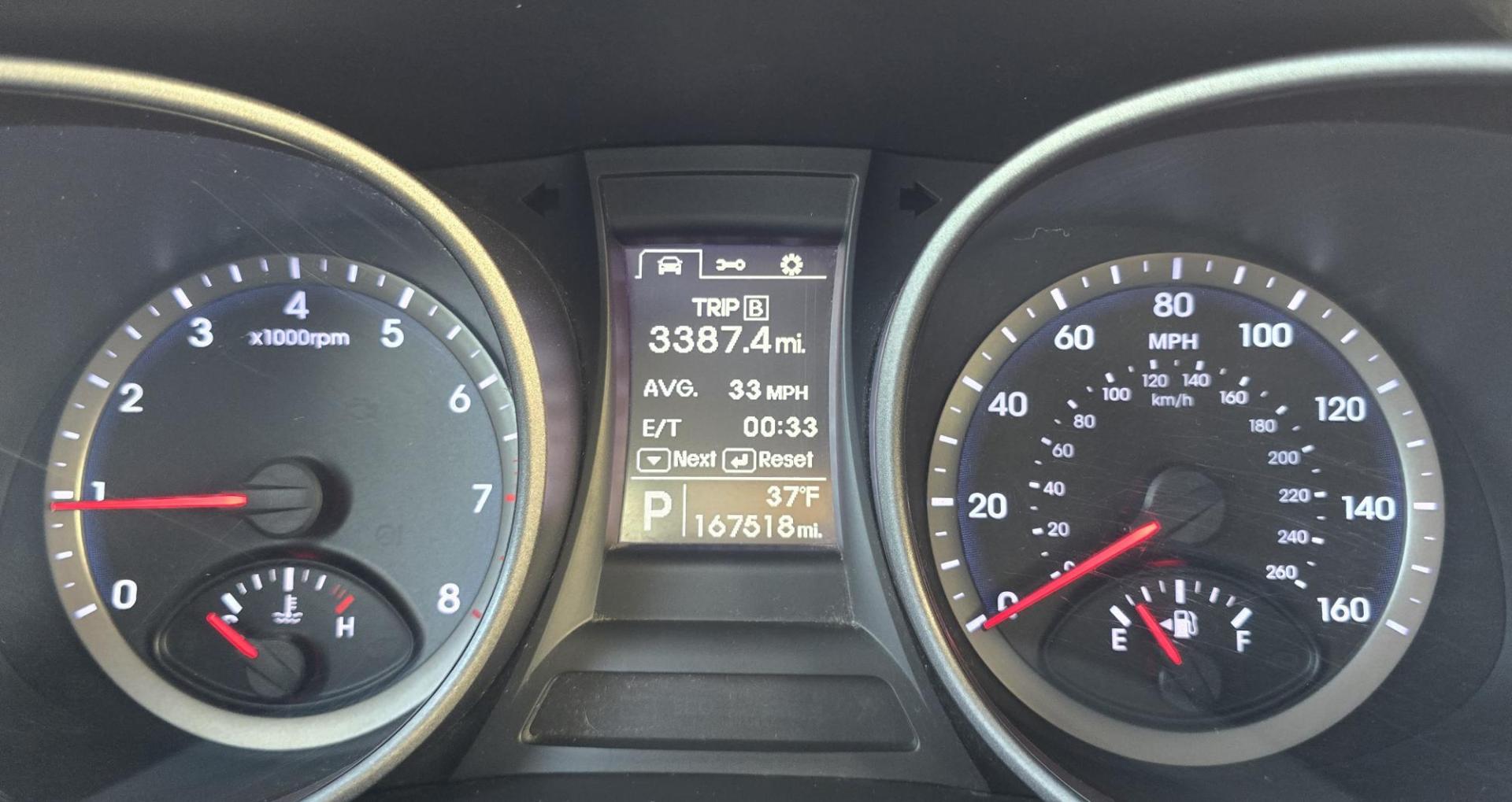 2014 Mineral Gray /Gray Hyundai Santa Fe Sport 2.4 AWD (5XYZTDLB5EG) with an 2.4L L4 DOHC 16V engine, 6-Speed Automatic transmission, located at 450 N Russell, Missoula, MT, 59801, (406) 543-6600, 46.874496, -114.017433 - Great Running FWD SUV Not all wheel drive. 2.4L I4 Engine. Automatic Transmission. Air. Cruise. Tilt. Power Windows and Locks. AM FM CD Player. Bluetooth Audio and Phone. Towing. Has a fair size scratch on the front left fender. - Photo#17