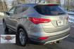 2014 Mineral Gray /Gray Hyundai Santa Fe Sport 2.4 AWD (5XYZTDLB5EG) with an 2.4L L4 DOHC 16V engine, 6-Speed Automatic transmission, located at 450 N Russell, Missoula, MT, 59801, (406) 543-6600, 46.874496, -114.017433 - Great Running FWD SUV Not all wheel drive. 2.4L I4 Engine. Automatic Transmission. Air. Cruise. Tilt. Power Windows and Locks. AM FM CD Player. Bluetooth Audio and Phone. Towing. Has a fair size scratch on the front left fender. - Photo#6
