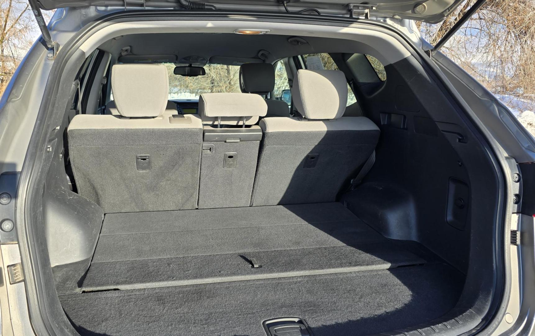 2014 Mineral Gray /Gray Hyundai Santa Fe Sport 2.4 AWD (5XYZTDLB5EG) with an 2.4L L4 DOHC 16V engine, 6-Speed Automatic transmission, located at 450 N Russell, Missoula, MT, 59801, (406) 543-6600, 46.874496, -114.017433 - Great Running FWD SUV Not all wheel drive. 2.4L I4 Engine. Automatic Transmission. Air. Cruise. Tilt. Power Windows and Locks. AM FM CD Player. Bluetooth Audio and Phone. Towing. Has a fair size scratch on the front left fender. - Photo#9