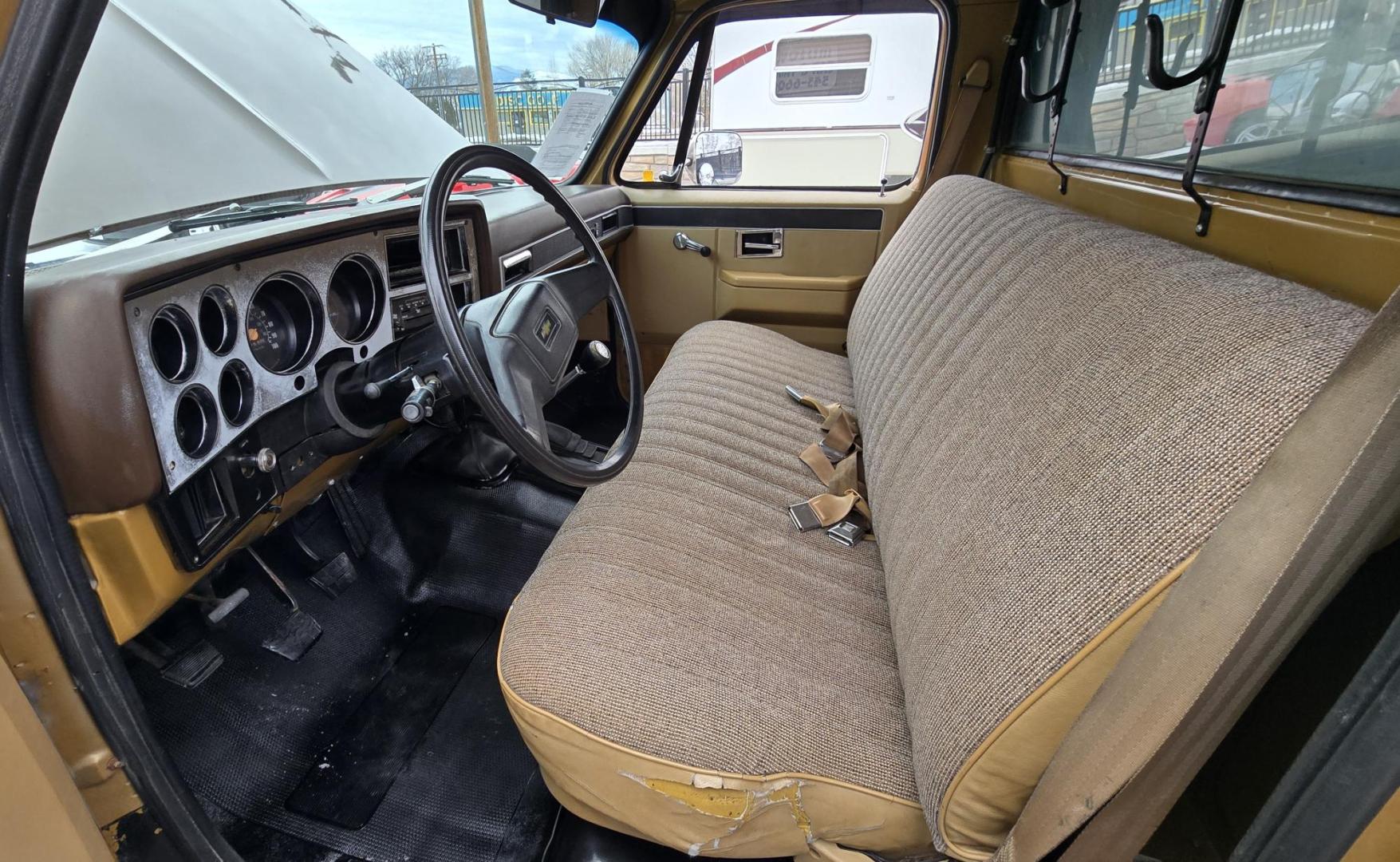1984 Brown /Tan Chevrolet C/K 10 Custom Deluxe 4WD (1GCEK14H3EJ) with an 5.0L V8 OHV engine, 4 Speed Manual transmission, located at 450 N Russell, Missoula, MT, 59801, (406) 543-6600, 46.874496, -114.017433 - Nice old Square Body 4WD. Brand NEW Tires. Matching Topper. 4 Speed Manual Transmission. 305 V8 Engine. Dual Gas Tanks. Runs amazing. Not perfect but good for it's age. - Photo#15