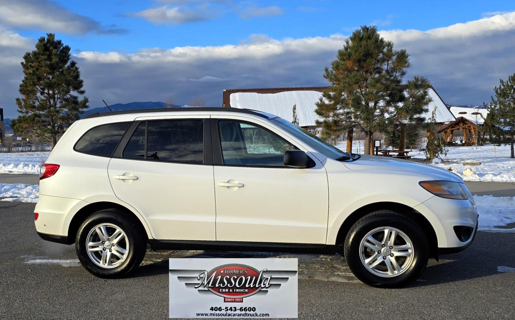 2011 White /Tan Hyundai Santa Fe GLS 3.5 4WD (5XYZGDAG7BG) with an 3.5L V6 DOHC 24V engine, 6-Speed Automatic transmission, located at 450 N Russell, Missoula, MT, 59801, (406) 543-6600, 46.874496, -114.017433 - Super Clean AWD SUV with only 92K Miles. Zippy 3.5L V6 Engine. 6 Speed Automatic. Bluetooth. AM FM CD. Air. Cruise. Tilt. Power Windows and Locks. Clean Carfax. - Photo#0