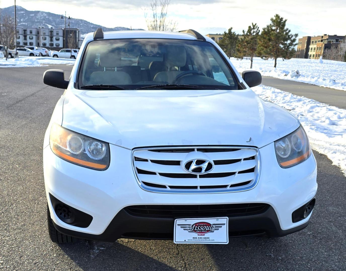 2011 White /Tan Hyundai Santa Fe GLS 3.5 4WD (5XYZGDAG7BG) with an 3.5L V6 DOHC 24V engine, 6-Speed Automatic transmission, located at 450 N Russell, Missoula, MT, 59801, (406) 543-6600, 46.874496, -114.017433 - Super Clean AWD SUV with only 92K Miles. Zippy 3.5L V6 Engine. 6 Speed Automatic. Bluetooth. AM FM CD. Air. Cruise. Tilt. Power Windows and Locks. Clean Carfax. - Photo#3