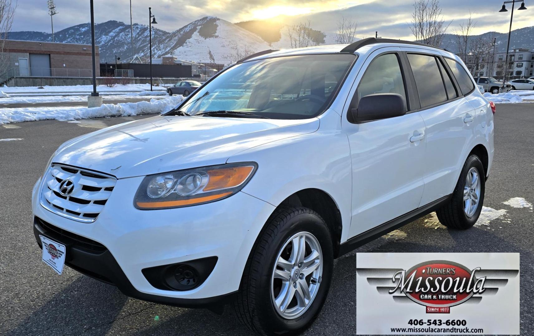 2011 White /Tan Hyundai Santa Fe GLS 3.5 4WD (5XYZGDAG7BG) with an 3.5L V6 DOHC 24V engine, 6-Speed Automatic transmission, located at 450 N Russell, Missoula, MT, 59801, (406) 543-6600, 46.874496, -114.017433 - Super Clean AWD SUV with only 92K Miles. Zippy 3.5L V6 Engine. 6 Speed Automatic. Bluetooth. AM FM CD. Air. Cruise. Tilt. Power Windows and Locks. Clean Carfax. - Photo#5
