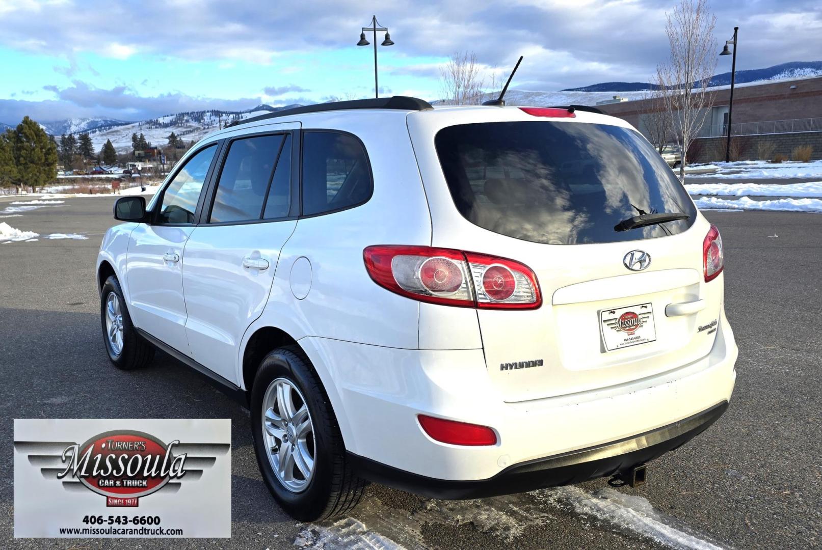 2011 White /Tan Hyundai Santa Fe GLS 3.5 4WD (5XYZGDAG7BG) with an 3.5L V6 DOHC 24V engine, 6-Speed Automatic transmission, located at 450 N Russell, Missoula, MT, 59801, (406) 543-6600, 46.874496, -114.017433 - Super Clean AWD SUV with only 92K Miles. Zippy 3.5L V6 Engine. 6 Speed Automatic. Bluetooth. AM FM CD. Air. Cruise. Tilt. Power Windows and Locks. Clean Carfax. - Photo#6