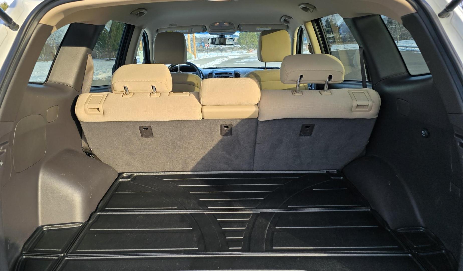 2011 White /Tan Hyundai Santa Fe GLS 3.5 4WD (5XYZGDAG7BG) with an 3.5L V6 DOHC 24V engine, 6-Speed Automatic transmission, located at 450 N Russell, Missoula, MT, 59801, (406) 543-6600, 46.874496, -114.017433 - Super Clean AWD SUV with only 92K Miles. Zippy 3.5L V6 Engine. 6 Speed Automatic. Bluetooth. AM FM CD. Air. Cruise. Tilt. Power Windows and Locks. Clean Carfax. - Photo#7