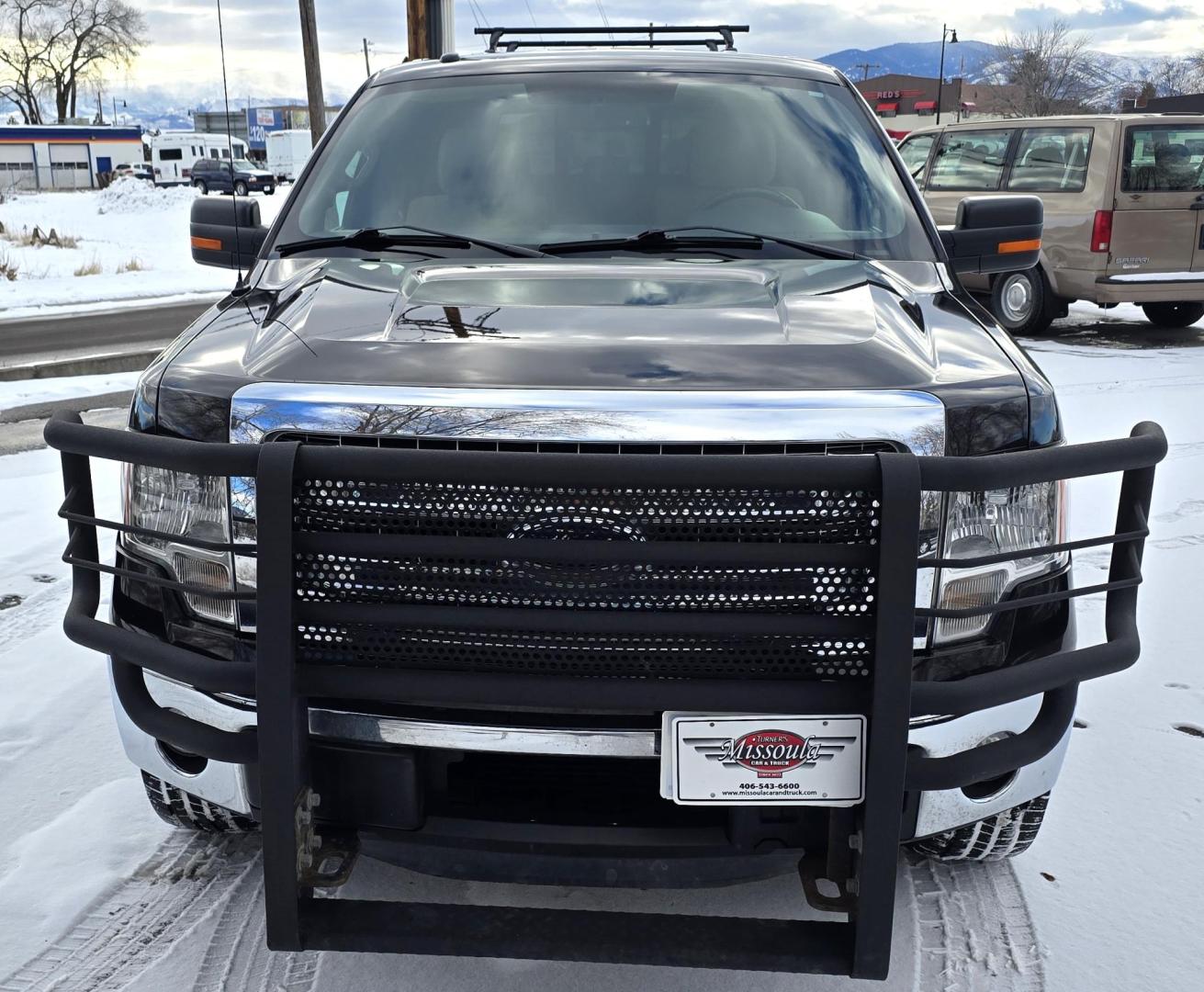2013 Brown /Tan Ford F-150 XLT SuperCrew 5.5-ft. Bed 4WD (1FTFW1ET8DF) with an 3.5L V6 TURBO engine, 6-Speed Automatic transmission, located at 450 N Russell, Missoula, MT, 59801, (406) 543-6600, 46.874496, -114.017433 - Beautiful Kodiak Brown Ford F150 XLT 4WD. 3.5L Eco V6. Matching Topper. Running Boards, Grill Guard. Air. Cruise. Tilt. Bluetooth. AM FM XM. Backup Camera. Super Clean. - Photo#6