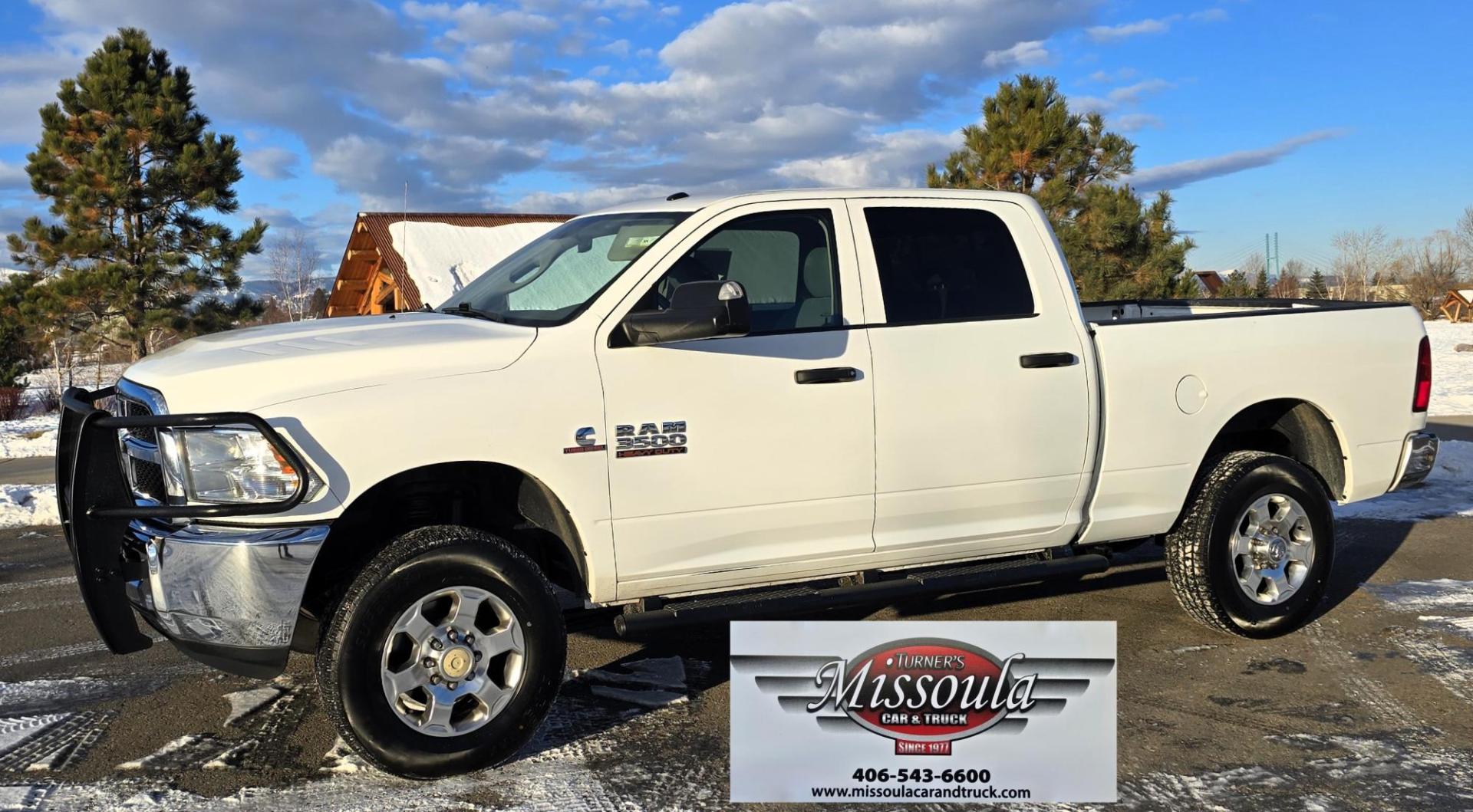 2018 White /Black RAM 3500 Tradesman Crew Cab 4WD (3C63R3CL3JG) with an 6.7L L6 OHV 24V TURBO DIESEL engine, 6A transmission, located at 450 N Russell, Missoula, MT, 59801, (406) 543-6600, 46.874496, -114.017433 - Beefy One Ton 4WD with 6.7L Cummins Diesel Engine. 6 Speed Manual Transmission. Bluetooth. Backup Camera. Grill Guard. Running Boards. Air. Cruise. Tilt. New Tires. Towing. Power Windows and Locks. One Owner with Clean Carfax. - Photo#1