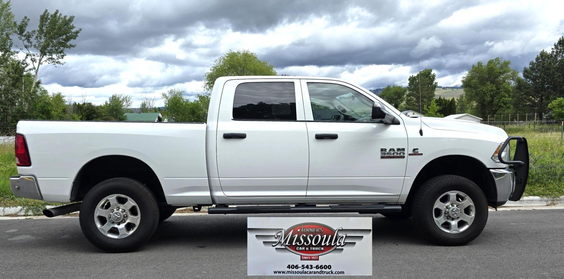 2018 White /Black RAM 3500 Tradesman Crew Cab 4WD (3C63R3CL3JG) with an 6.7L L6 OHV 24V TURBO DIESEL engine, 6A transmission, located at 450 N Russell, Missoula, MT, 59801, (406) 543-6600, 46.874496, -114.017433 - Photo#1