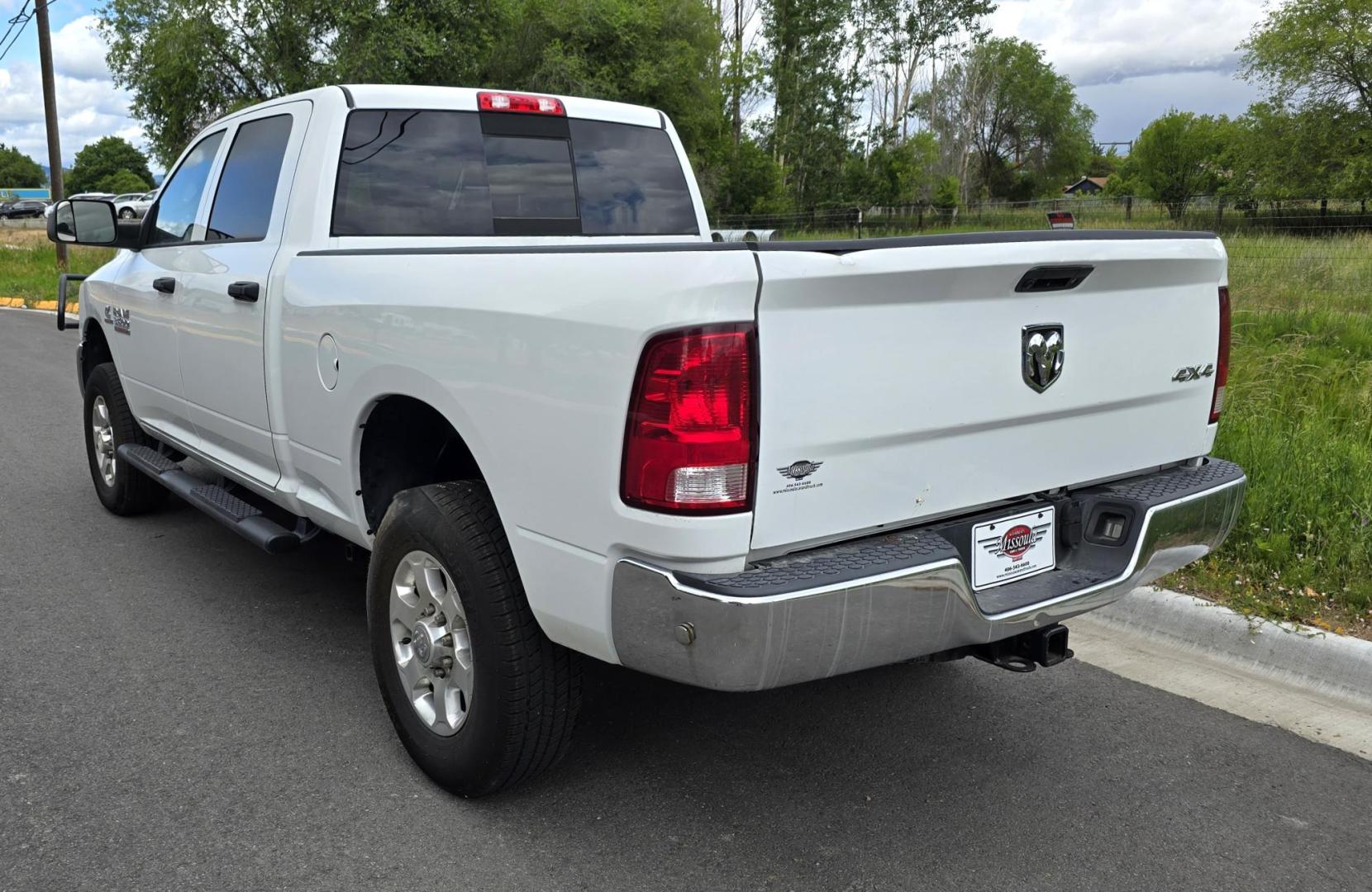 2018 White /Black RAM 3500 Tradesman Crew Cab 4WD (3C63R3CL3JG) with an 6.7L L6 OHV 24V TURBO DIESEL engine, 6A transmission, located at 450 N Russell, Missoula, MT, 59801, (406) 543-6600, 46.874496, -114.017433 - Photo#4