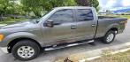 2010 Grey /Gray Ford F-150 XLT SuperCrew 5.5-ft. Bed 4WD (1FTFW1EV4AF) with an 5.4L V8 SOHC 24V FFV engine, 4-Speed Automatic transmission, located at 450 N Russell, Missoula, MT, 59801, (406) 543-6600, 46.874496, -114.017433 - Great Running F150 XLT 4WD. 5.4L V8. 6 Speed Automatic Transmission. 2 Owner with Clean Carfax. Power Drivers Seat. Air. Cruise. Tilt. Adjustable Pedals. Power Windows and Locks. AM FM XM CD. Bluetooth Audio and Phone. Running Boards. - Photo#3