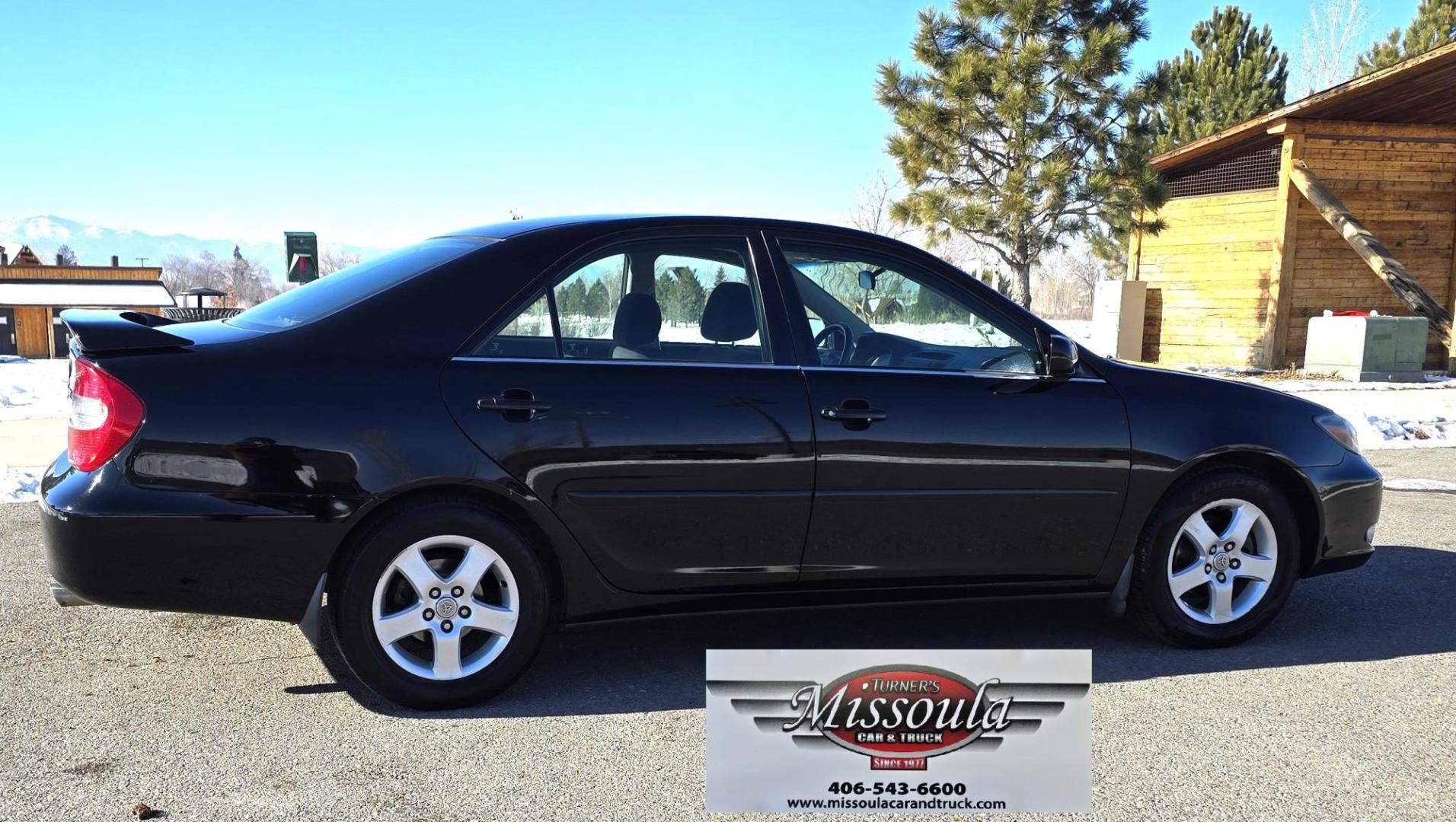 2002 Black /Black Toyota Camry LE (4T1BE32K52U) with an 2.4L L4 DOHC 16V engine, Automatic transmission, located at 450 N Russell, Missoula, MT, 59801, (406) 543-6600, 46.874496, -114.017433 - Very Clean 2 Owner Camry in Excellent condition. 2.4L I4 Engine. Automatic Transmission. Front Wheel Drive. Power Sunroof. Power Drivers Seat. Touch Screen Stereo with Bluetooth. Air. Cruise. Tilt. New Tires. Because of the age, financing is not available through our lenders. - Photo#0