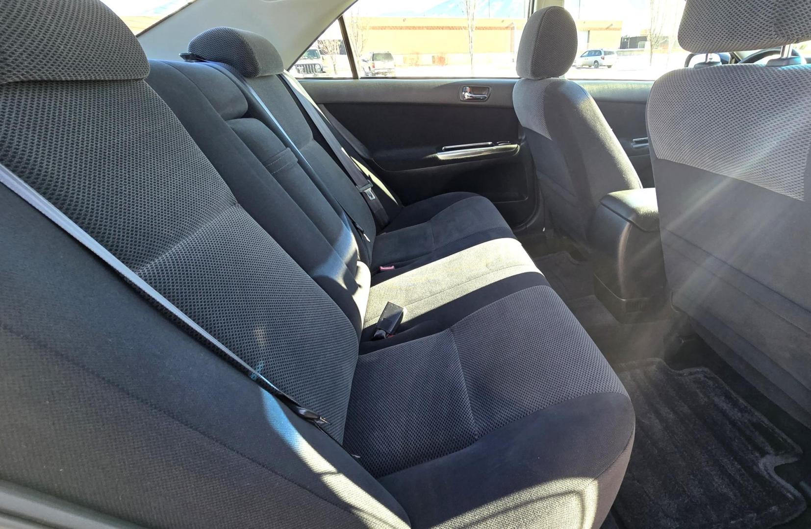 2002 Black /Black Toyota Camry LE (4T1BE32K52U) with an 2.4L L4 DOHC 16V engine, Automatic transmission, located at 450 N Russell, Missoula, MT, 59801, (406) 543-6600, 46.874496, -114.017433 - Very Clean 2 Owner Camry in Excellent condition. 2.4L I4 Engine. Automatic Transmission. Front Wheel Drive. Power Sunroof. Power Drivers Seat. Touch Screen Stereo with Bluetooth. Air. Cruise. Tilt. New Tires. Because of the age, financing is not available through our lenders. - Photo#7