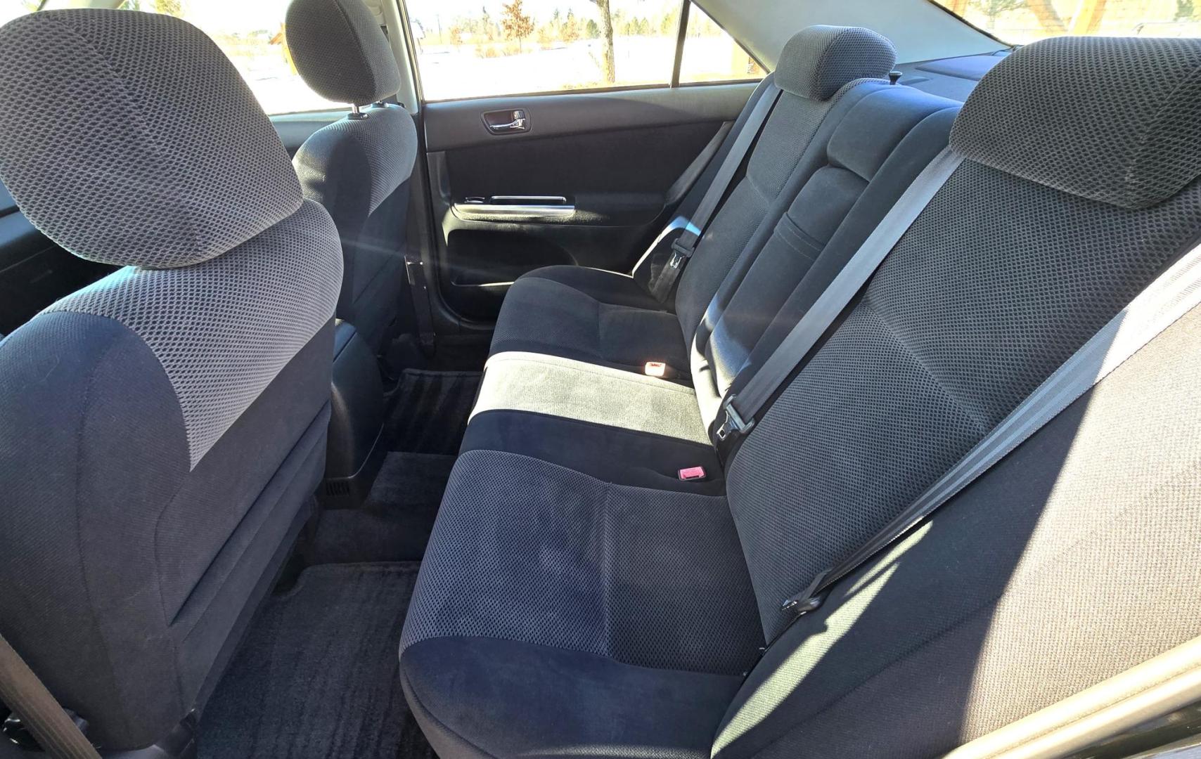 2002 Black /Black Toyota Camry LE (4T1BE32K52U) with an 2.4L L4 DOHC 16V engine, Automatic transmission, located at 450 N Russell, Missoula, MT, 59801, (406) 543-6600, 46.874496, -114.017433 - Very Clean 2 Owner Camry in Excellent condition. 2.4L I4 Engine. Automatic Transmission. Front Wheel Drive. Power Sunroof. Power Drivers Seat. Touch Screen Stereo with Bluetooth. Air. Cruise. Tilt. New Tires. Because of the age, financing is not available through our lenders. - Photo#8