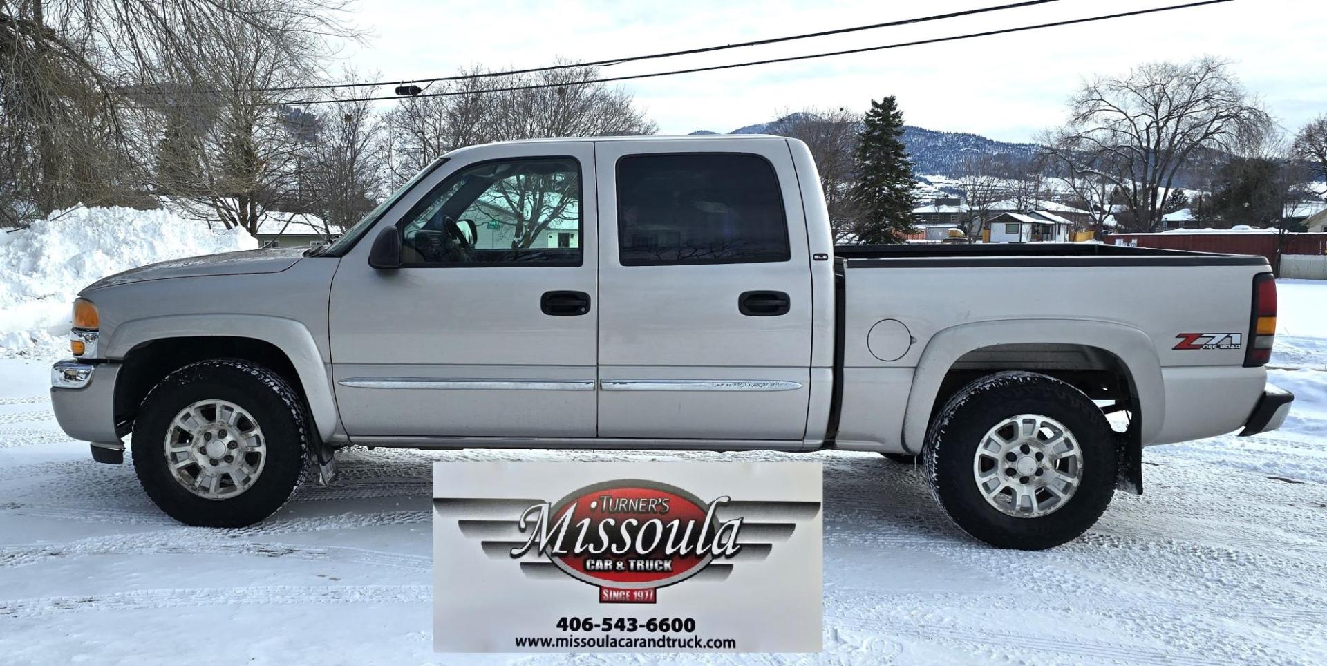 2005 Silver /Gray GMC Sierra 1500 SLE Crew Cab Short Bed 4WD (2GTEK13T151) with an 5.3L V8 OHV 16V engine, 4-Speed Automatic Overdrive transmission, located at 450 N Russell, Missoula, MT, 59801, (406) 543-6600, 46.874496, -114.017433 - Excellent Running 4WD. 5.3L V8 Engine. Automatic Transmission. Air. Cruise. Tilt. Power Drivers Seat. AM FM XM CD. Power Windows and Locks. Very Clean two owner vehicle. Because of the age, our Credit Union does not offer financing on this vehicle. - Photo#1