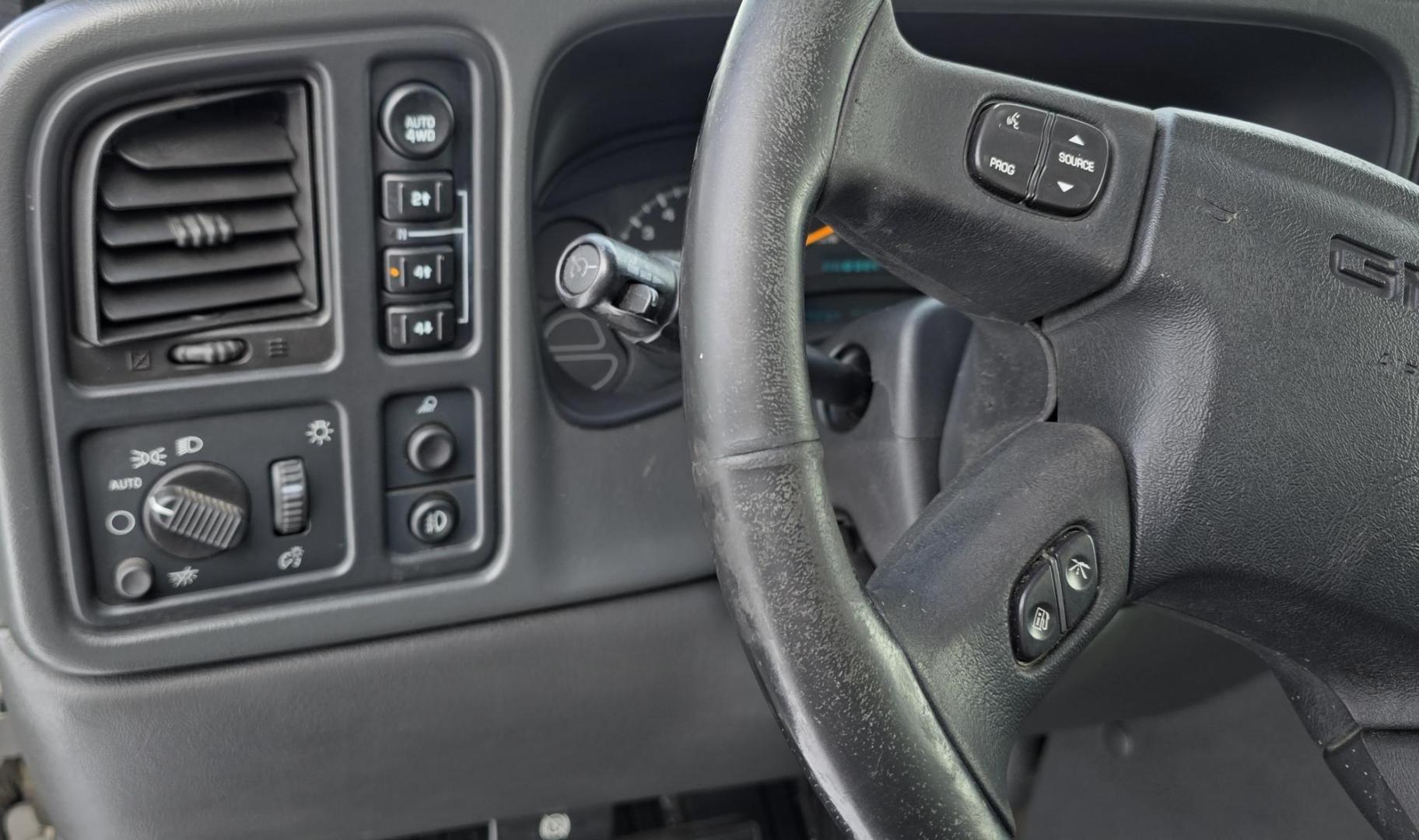 2005 Silver /Gray GMC Sierra 1500 SLE Crew Cab Short Bed 4WD (2GTEK13T151) with an 5.3L V8 OHV 16V engine, 4-Speed Automatic Overdrive transmission, located at 450 N Russell, Missoula, MT, 59801, (406) 543-6600, 46.874496, -114.017433 - Excellent Running 4WD. 5.3L V8 Engine. Automatic Transmission. Air. Cruise. Tilt. Power Drivers Seat. AM FM XM CD. Power Windows and Locks. Very Clean two owner vehicle. Because of the age, our Credit Union does not offer financing on this vehicle. - Photo#10