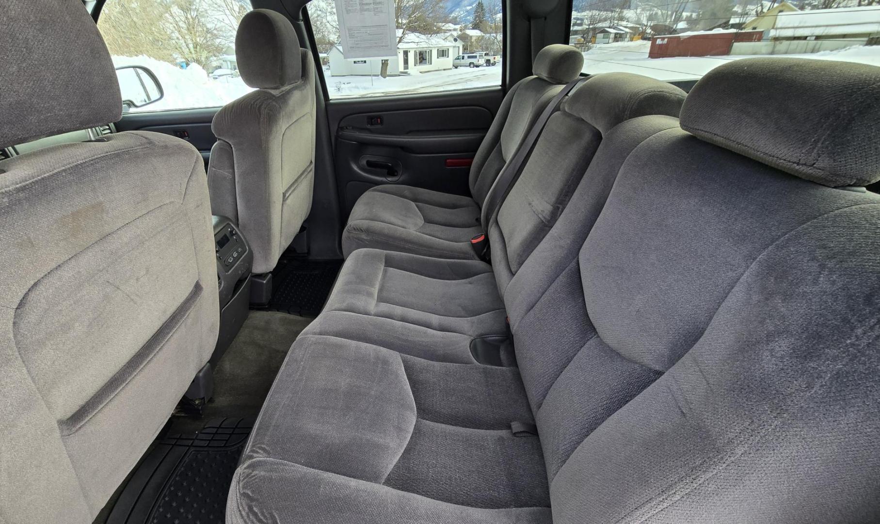 2005 Silver /Gray GMC Sierra 1500 SLE Crew Cab Short Bed 4WD (2GTEK13T151) with an 5.3L V8 OHV 16V engine, 4-Speed Automatic Overdrive transmission, located at 450 N Russell, Missoula, MT, 59801, (406) 543-6600, 46.874496, -114.017433 - Excellent Running 4WD. 5.3L V8 Engine. Automatic Transmission. Air. Cruise. Tilt. Power Drivers Seat. AM FM XM CD. Power Windows and Locks. Very Clean two owner vehicle. Because of the age, our Credit Union does not offer financing on this vehicle. - Photo#11