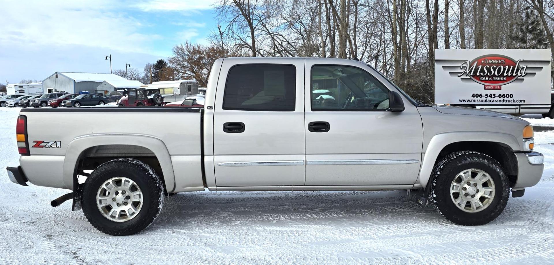 2005 Silver /Gray GMC Sierra 1500 SLE Crew Cab Short Bed 4WD (2GTEK13T151) with an 5.3L V8 OHV 16V engine, 4-Speed Automatic Overdrive transmission, located at 450 N Russell, Missoula, MT, 59801, (406) 543-6600, 46.874496, -114.017433 - Excellent Running 4WD. 5.3L V8 Engine. Automatic Transmission. Air. Cruise. Tilt. Power Drivers Seat. AM FM XM CD. Power Windows and Locks. Very Clean two owner vehicle. Because of the age, our Credit Union does not offer financing on this vehicle. - Photo#4