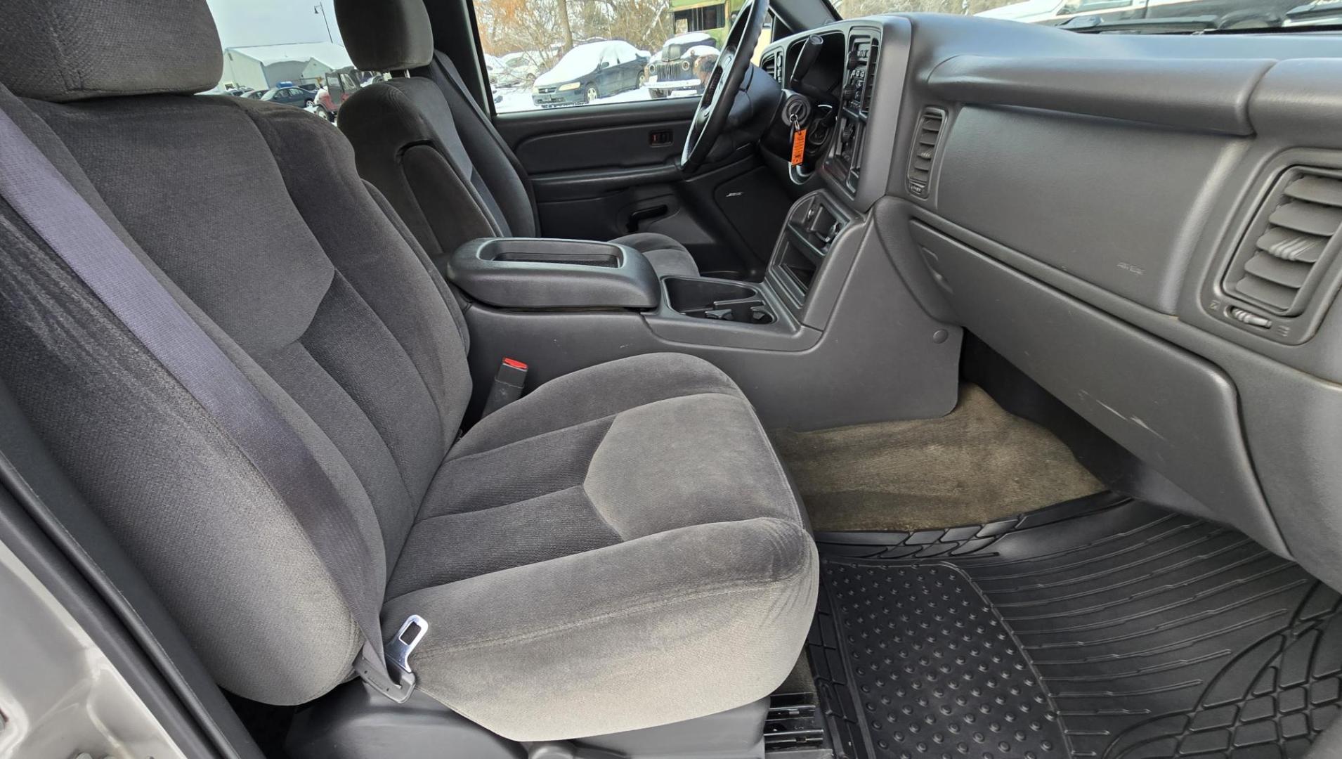 2005 Silver /Gray GMC Sierra 1500 SLE Crew Cab Short Bed 4WD (2GTEK13T151) with an 5.3L V8 OHV 16V engine, 4-Speed Automatic Overdrive transmission, located at 450 N Russell, Missoula, MT, 59801, (406) 543-6600, 46.874496, -114.017433 - Excellent Running 4WD. 5.3L V8 Engine. Automatic Transmission. Air. Cruise. Tilt. Power Drivers Seat. AM FM XM CD. Power Windows and Locks. Very Clean two owner vehicle. Because of the age, our Credit Union does not offer financing on this vehicle. - Photo#6