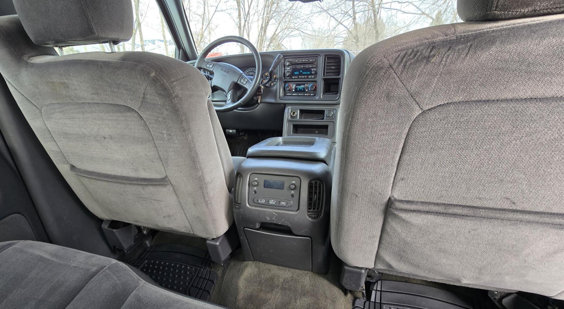 2005 Silver /Gray GMC Sierra 1500 SLE Crew Cab Short Bed 4WD (2GTEK13T151) with an 5.3L V8 OHV 16V engine, 4-Speed Automatic Overdrive transmission, located at 450 N Russell, Missoula, MT, 59801, (406) 543-6600, 46.874496, -114.017433 - Excellent Running 4WD. 5.3L V8 Engine. Automatic Transmission. Air. Cruise. Tilt. Power Drivers Seat. AM FM XM CD. Power Windows and Locks. Very Clean two owner vehicle. Because of the age, our Credit Union does not offer financing on this vehicle. - Photo#7