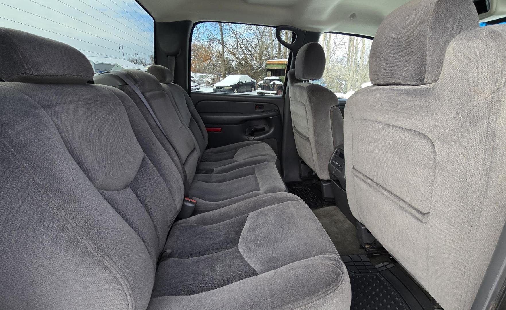 2005 Silver /Gray GMC Sierra 1500 SLE Crew Cab Short Bed 4WD (2GTEK13T151) with an 5.3L V8 OHV 16V engine, 4-Speed Automatic Overdrive transmission, located at 450 N Russell, Missoula, MT, 59801, (406) 543-6600, 46.874496, -114.017433 - Excellent Running 4WD. 5.3L V8 Engine. Automatic Transmission. Air. Cruise. Tilt. Power Drivers Seat. AM FM XM CD. Power Windows and Locks. Very Clean two owner vehicle. Because of the age, our Credit Union does not offer financing on this vehicle. - Photo#8