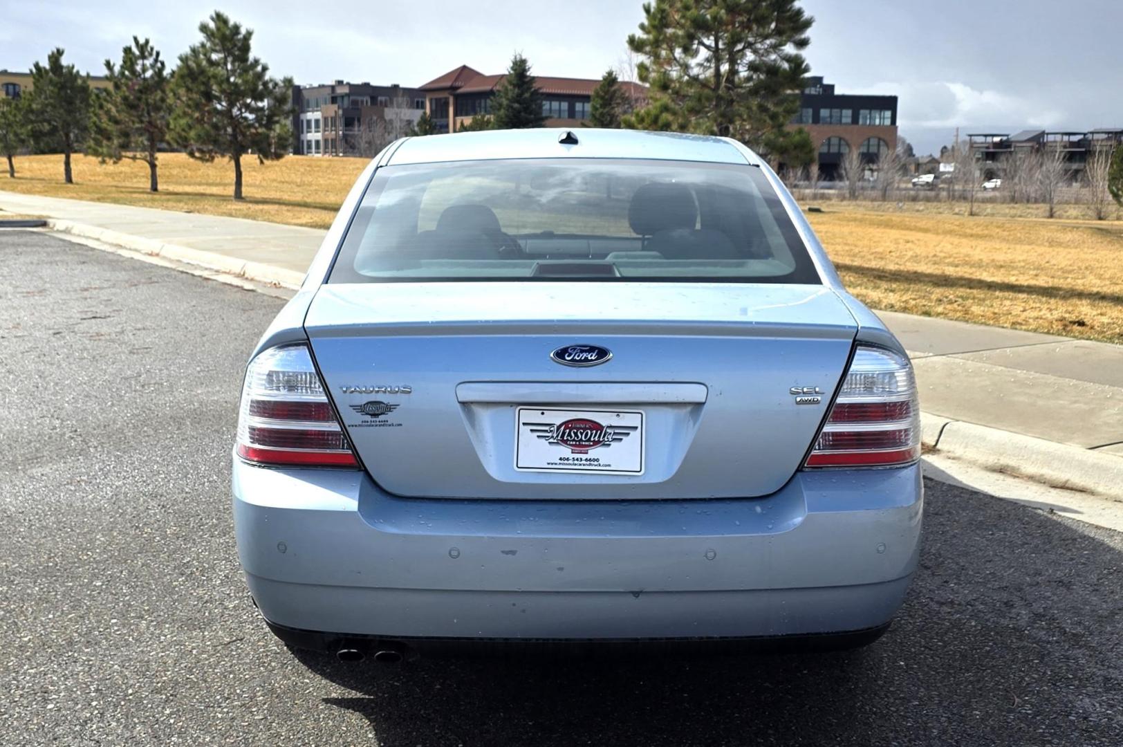 2008 Blue /Tan Ford Taurus SEL AWD (1FAHP27W98G) with an 3.5L V6 DOHC 24V engine, 6-Speed Automatic Overdrive transmission, located at 450 N Russell, Missoula, MT, 59801, (406) 543-6600, 46.874496, -114.017433 - Very Clean 2 Owner AWD Sedan. Only 78K Miles. 3.5L V6 Engine. Power Front Seats. Air. Cruise. Tilt. Power Windows and Locks. AM FM CD Player. - Photo#3